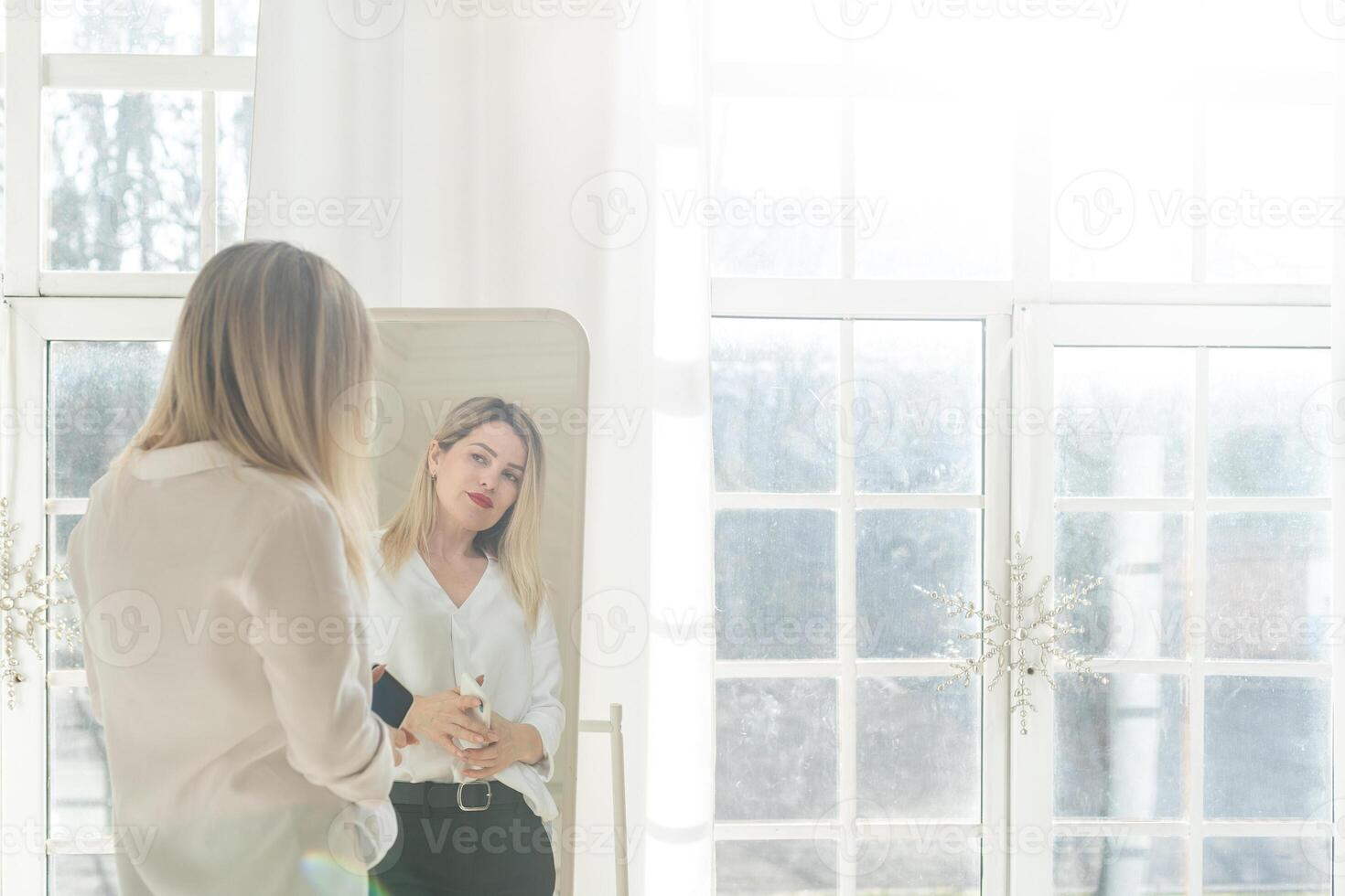 A beautiful woman shopping in a fashion store photo