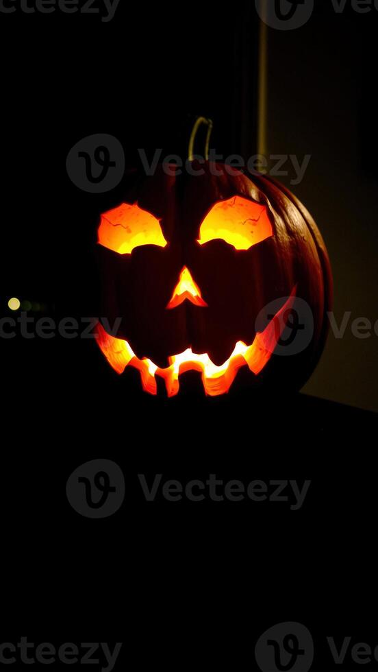 Glowing Jack-o'-Lantern in the Dark photo