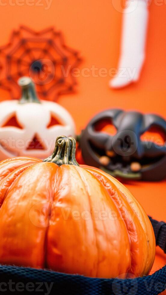 Pumpkin Close Up with Orange Background photo