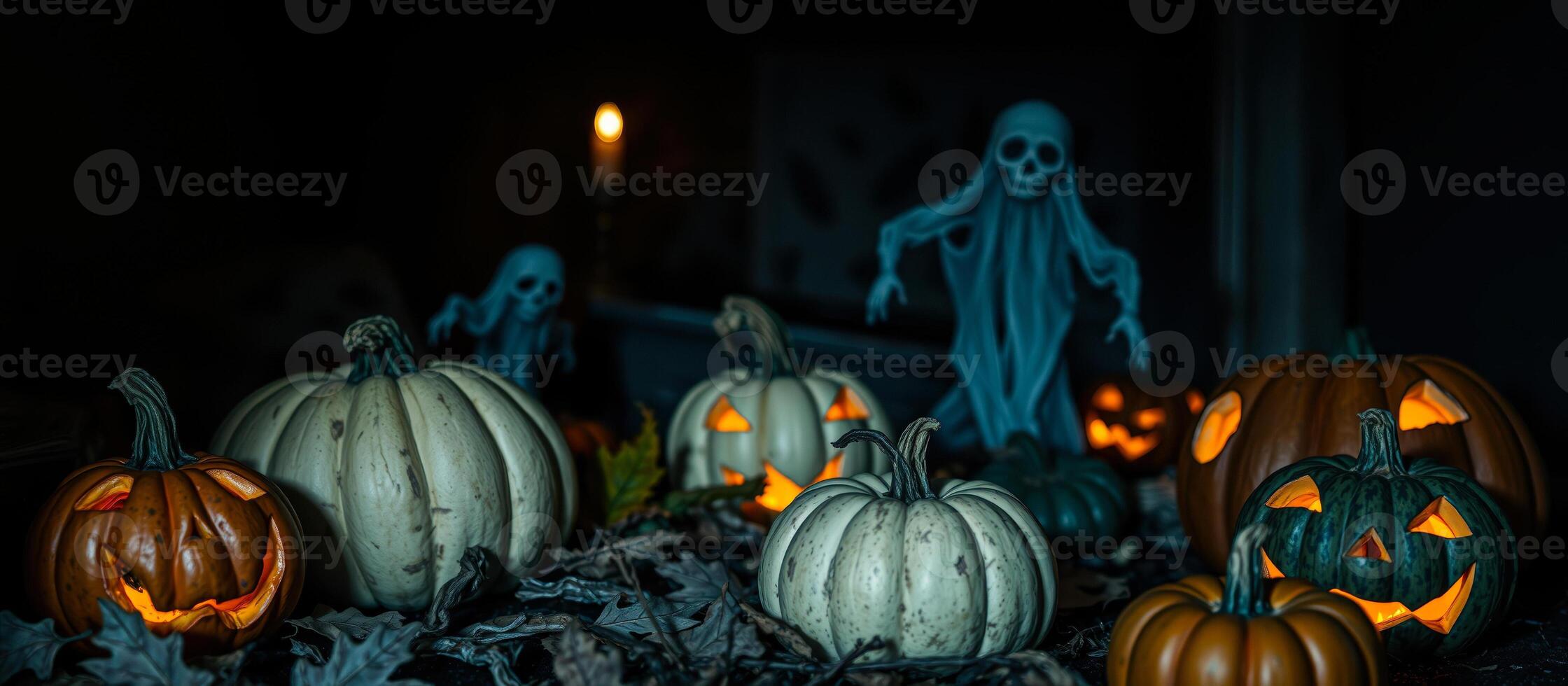 illuminated pumpkins create a spooky halloween scene photo