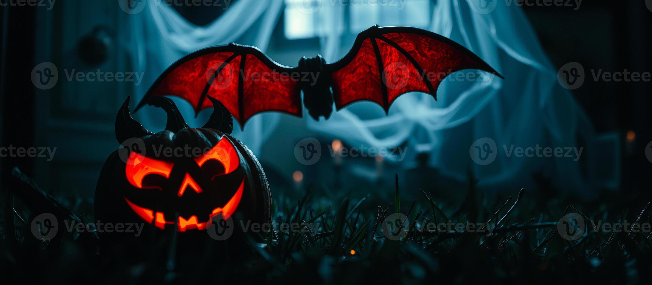 glowing jack-o'-lantern with devil horns translucent wings photo