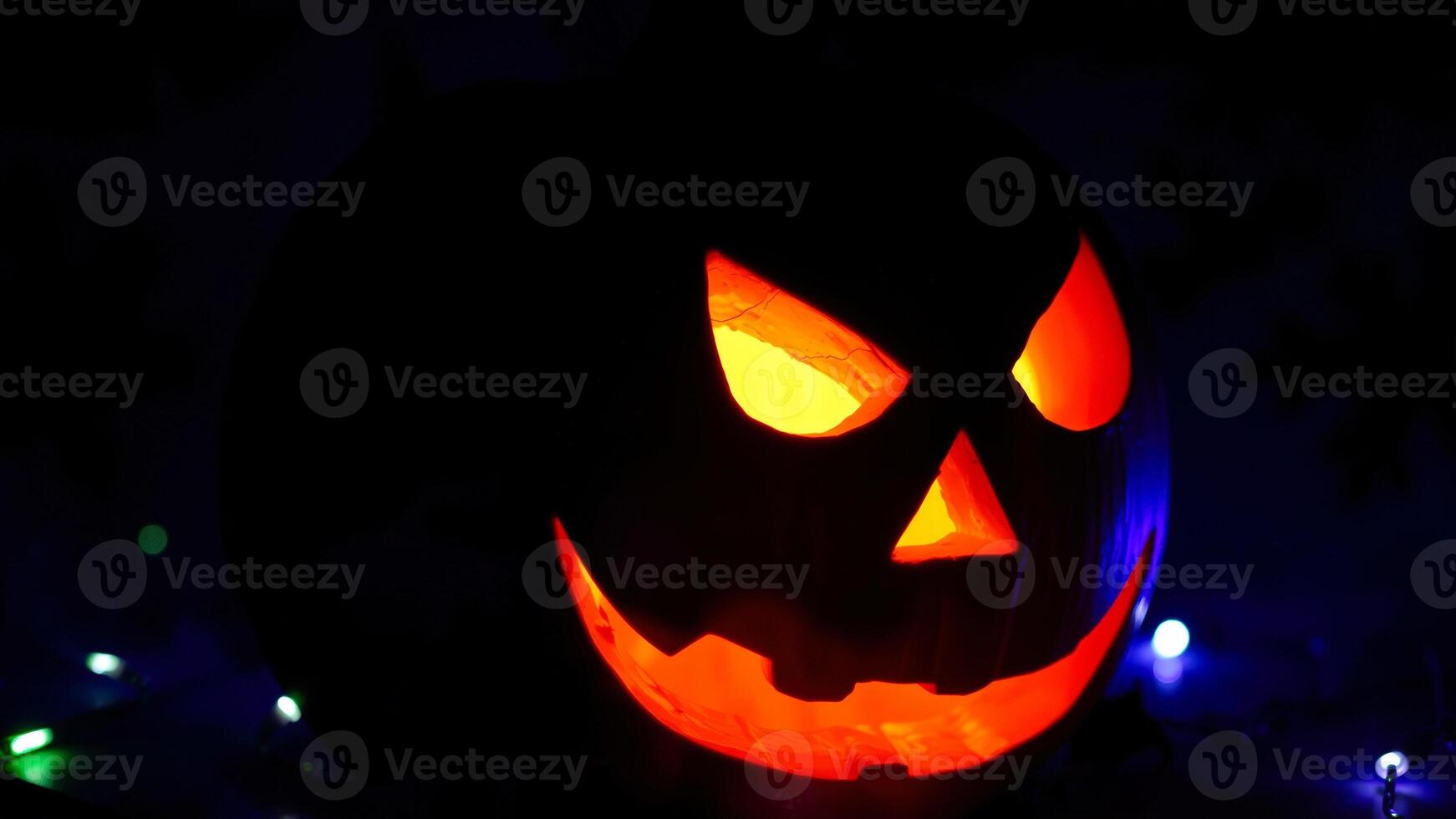 glowing jack-o'-lantern the darkness photo