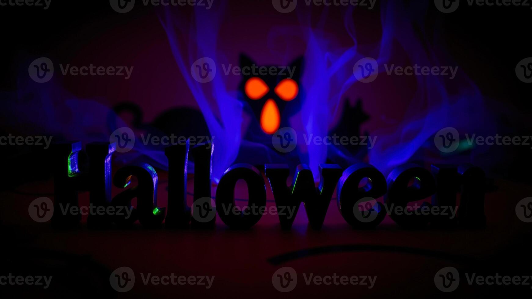 illuminated wooden halloween letters with a spooky glow photo