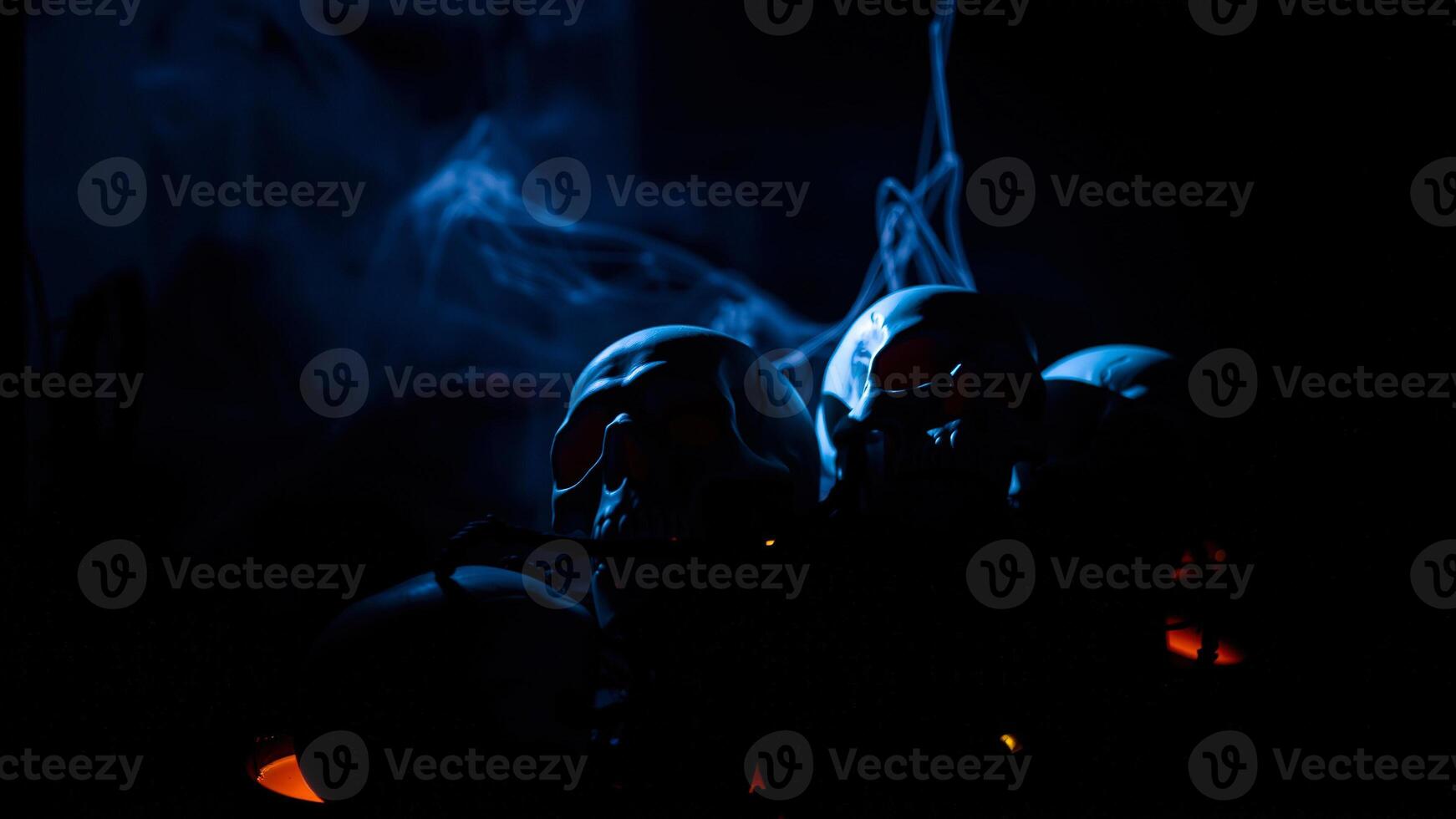 illuminated skulls blue smoke photo