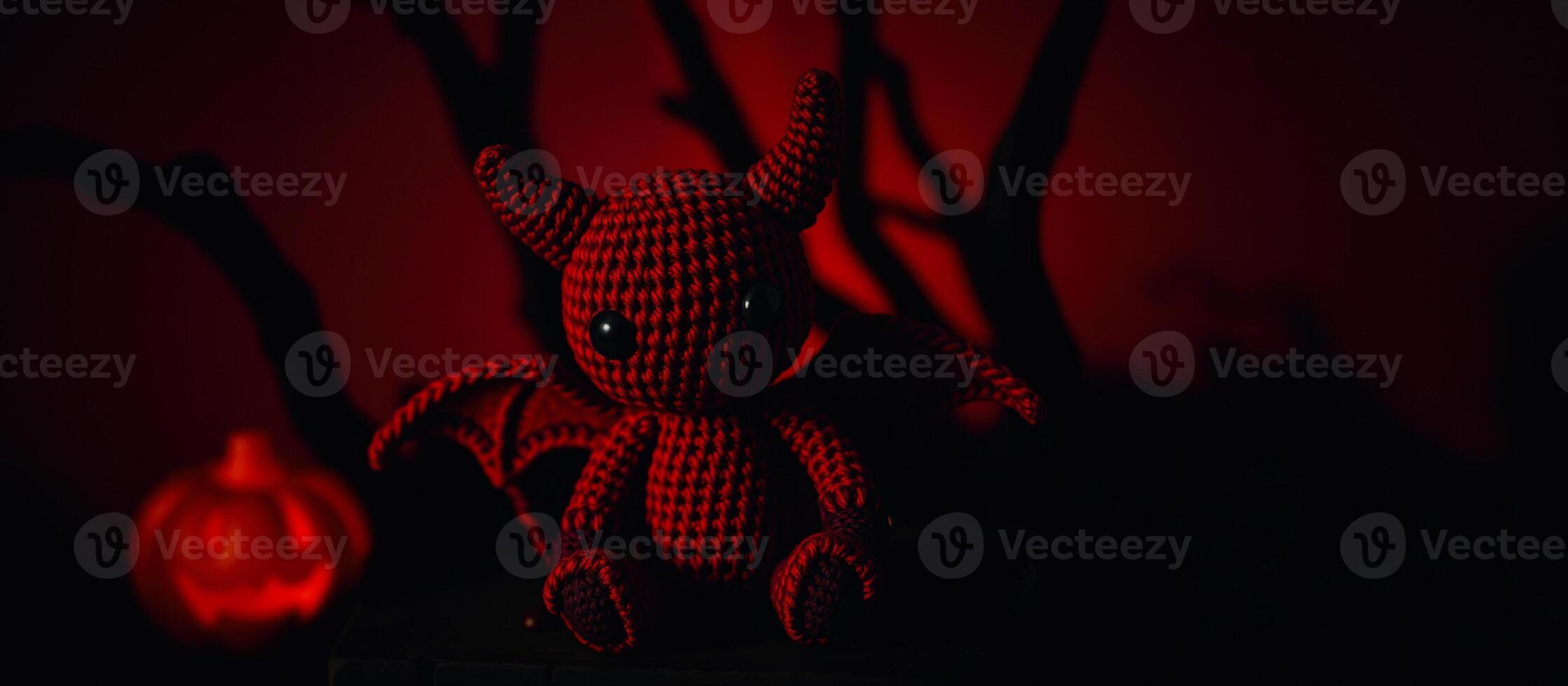 crocheted devil figure the shadows photo