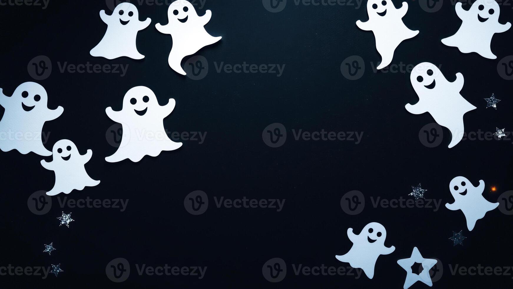 smiling paper ghosts glittering stars on a dark background photo