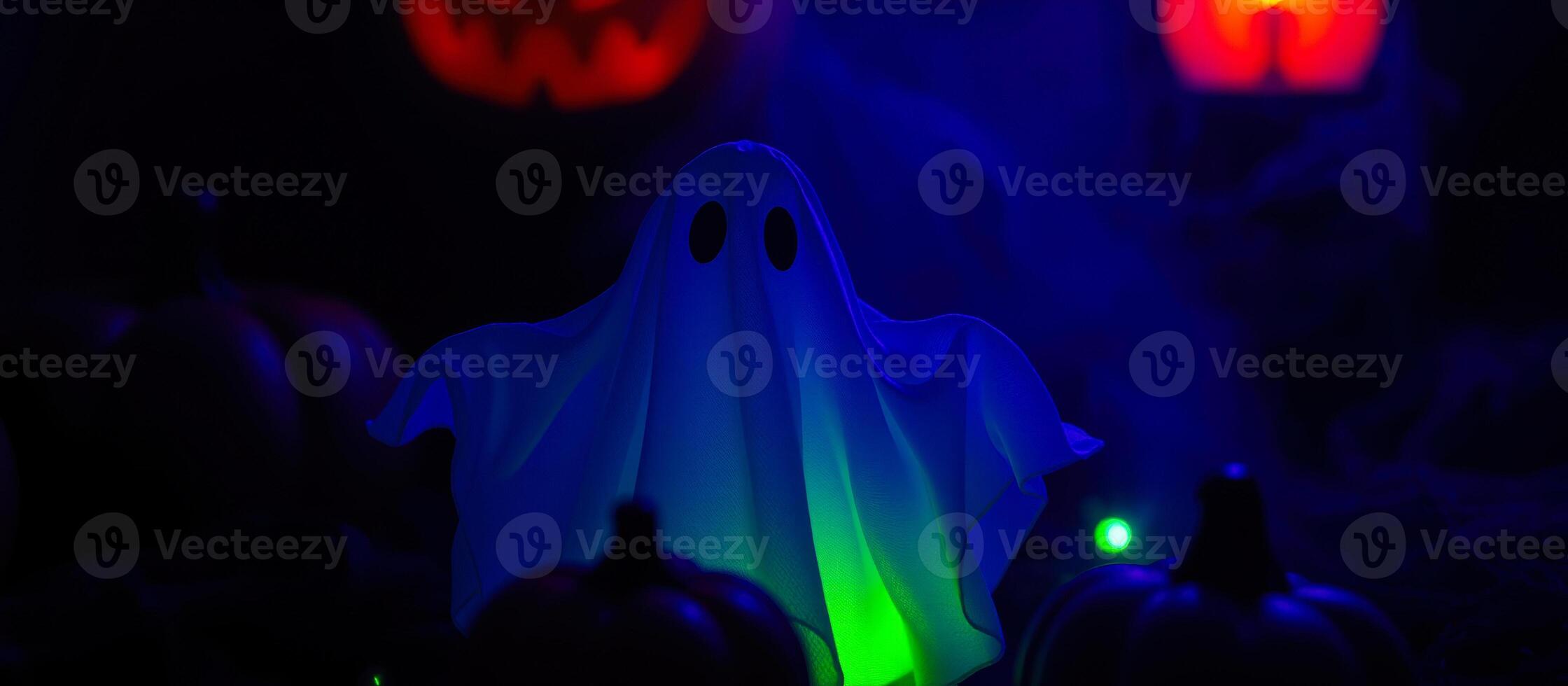 glowing ghost amidst dark pumpkins photo
