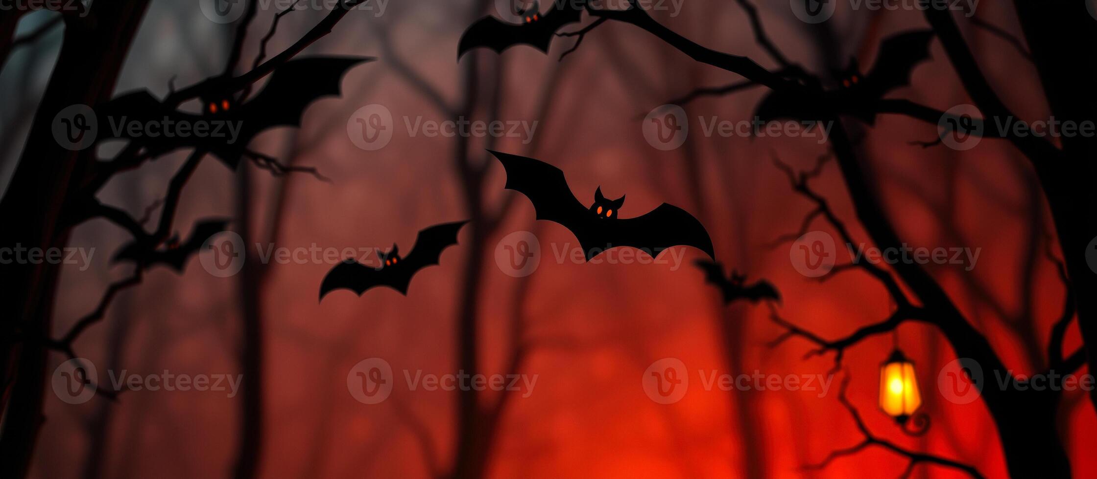 bats fly through a spooky forest at night photo