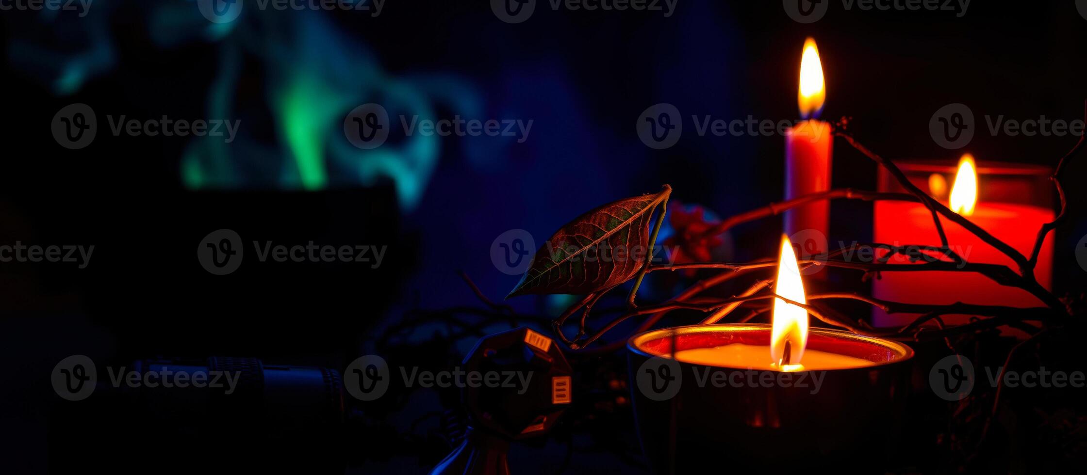 three candles casting a warm glow the dark photo