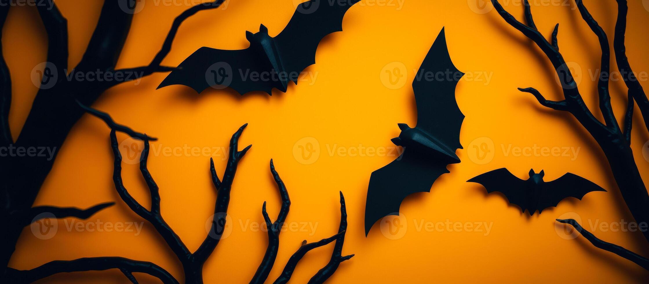 black paper bats on an background photo