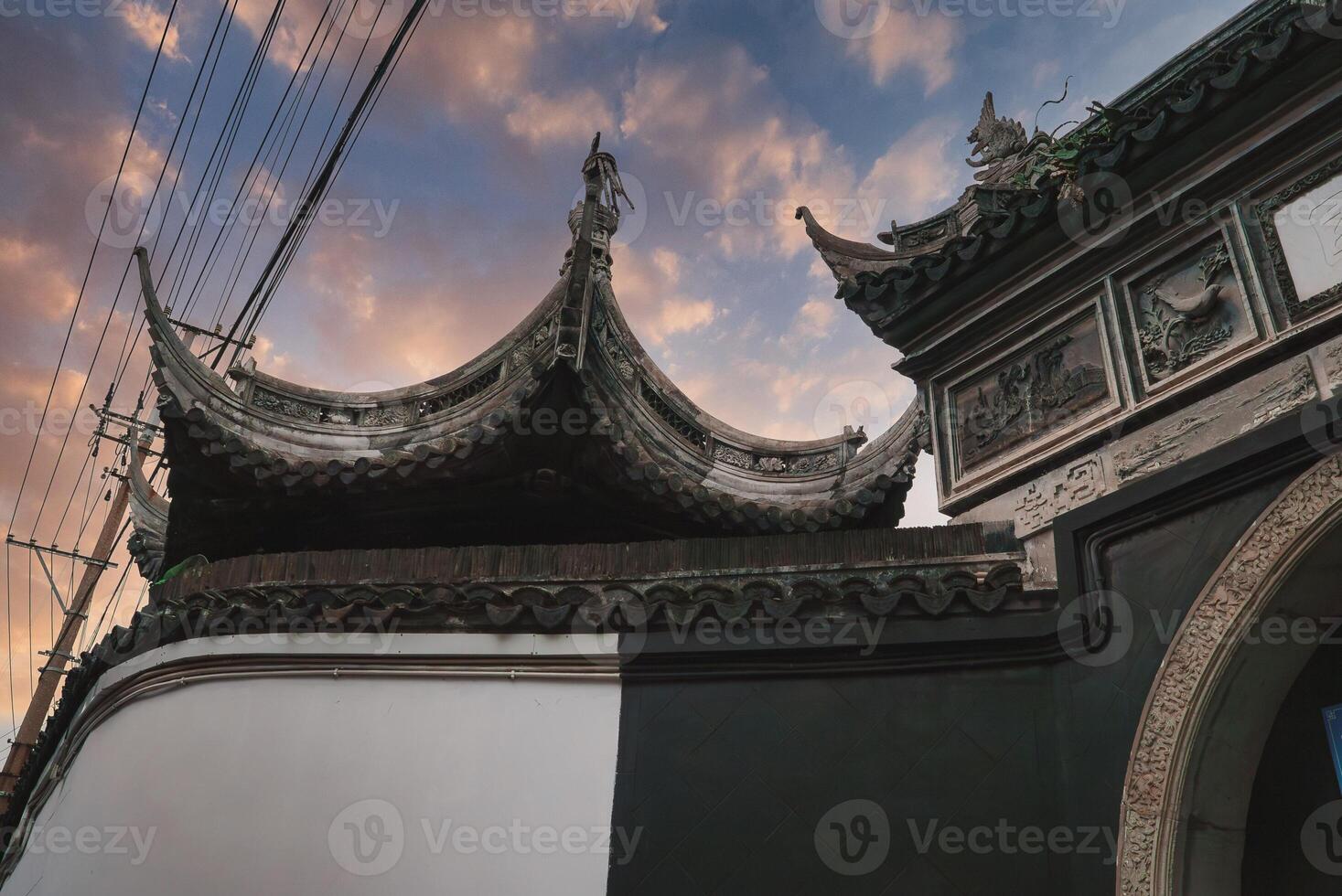 Traditional Chinese Architecture at Sunset in Shanghai's Old Town photo
