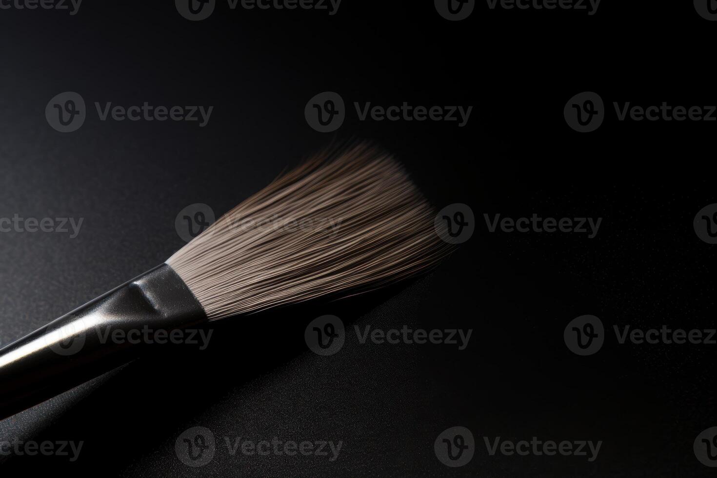 close up of makeup brush with soft bristles photo