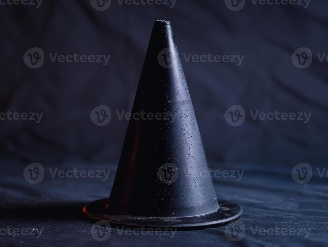 dark mysterious cone shaped object photo