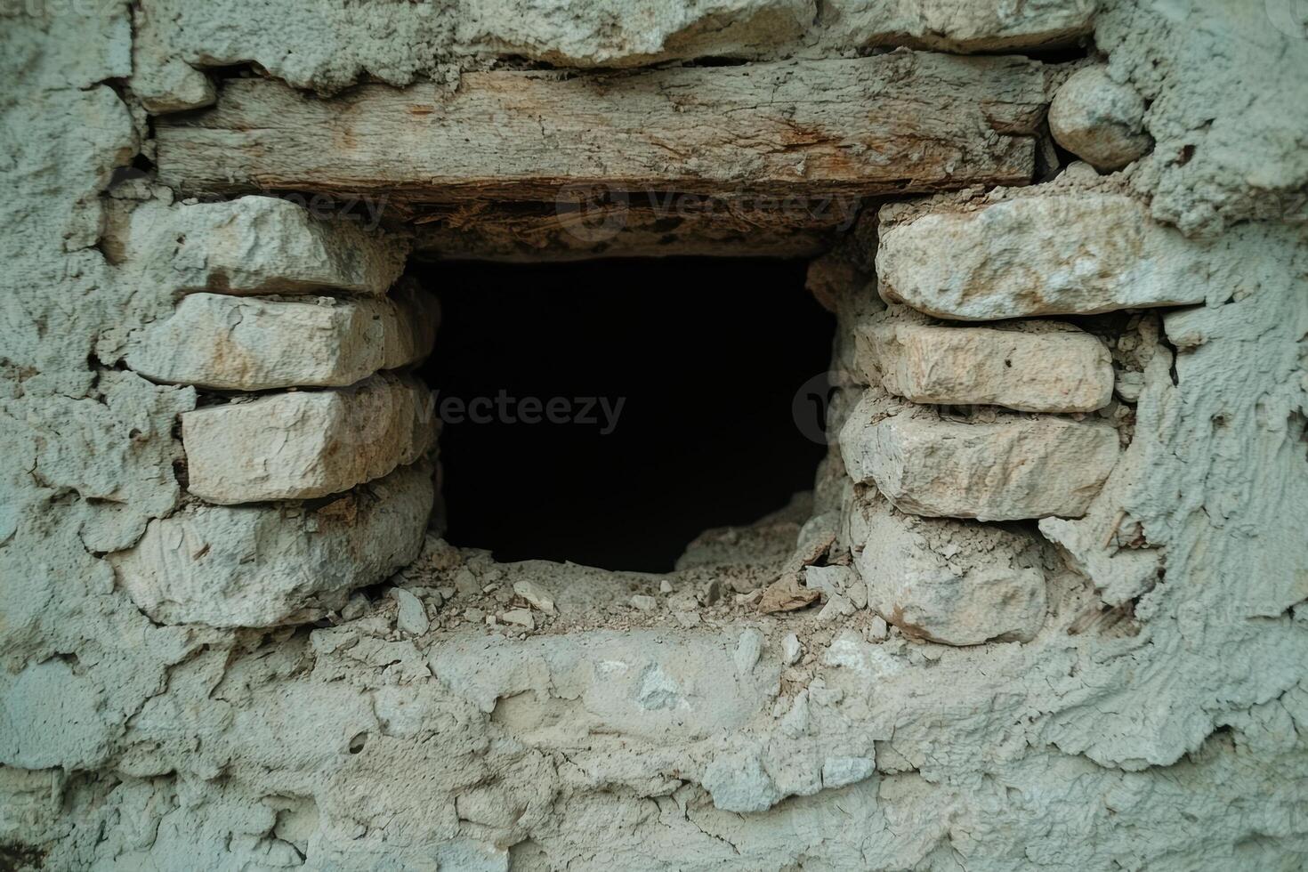 Entrance to an old stone cave photo