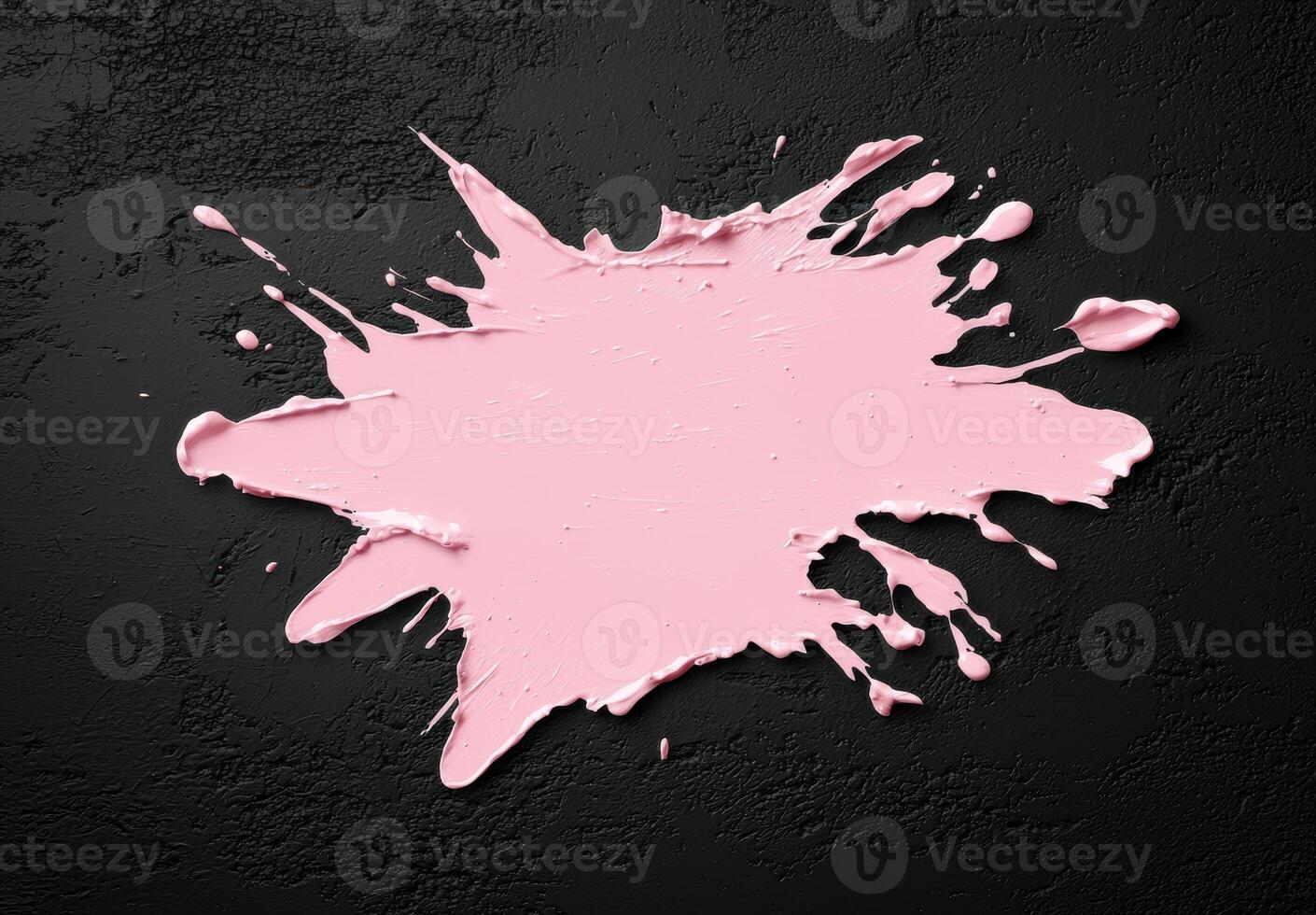 Splattered pink paint on black background photo