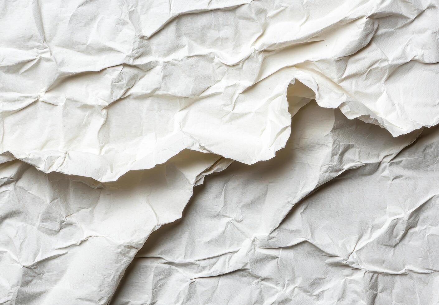 Crumpled white paper texture background photo