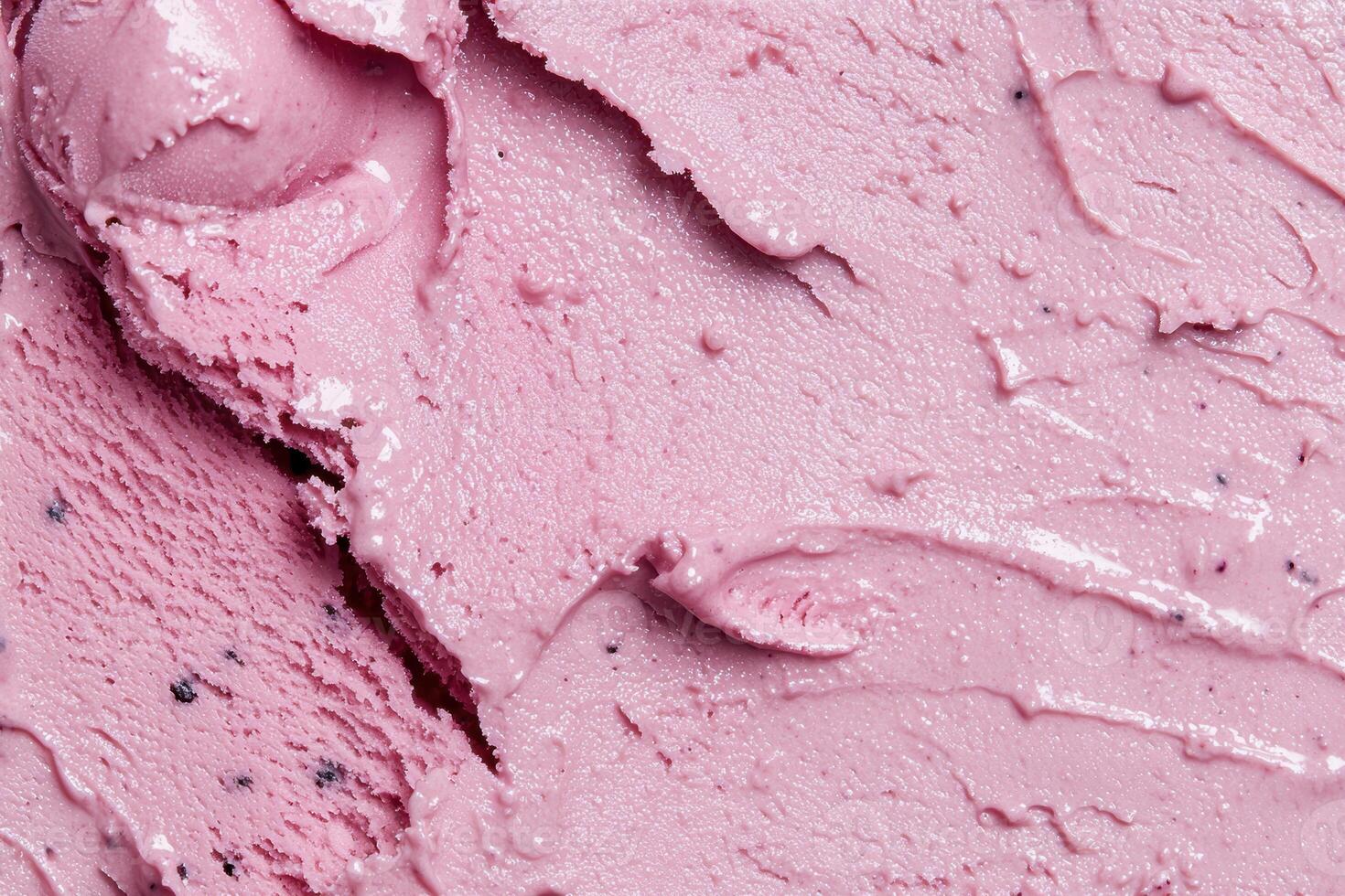 Close up of a creamy pink ice cream texture photo