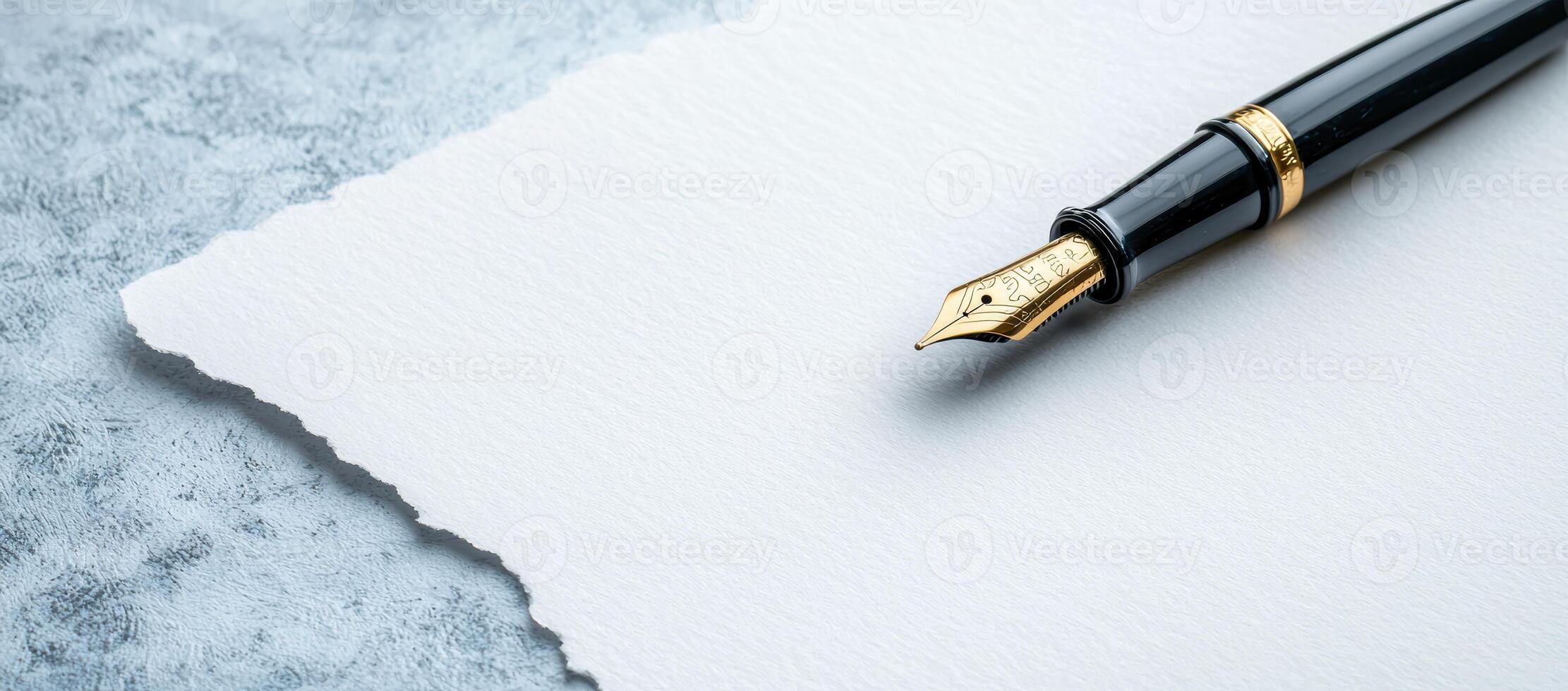 close up of a fountain pen on a textured paper photo
