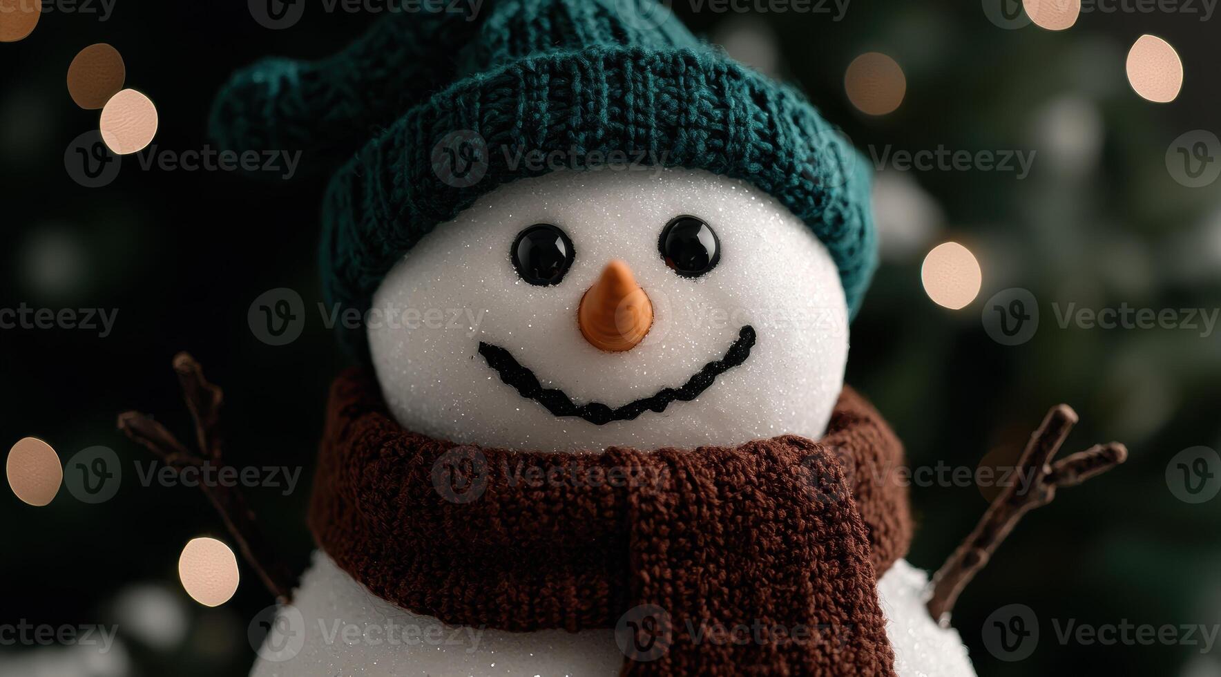 Cheerful snowman with knitted hat and scarf photo