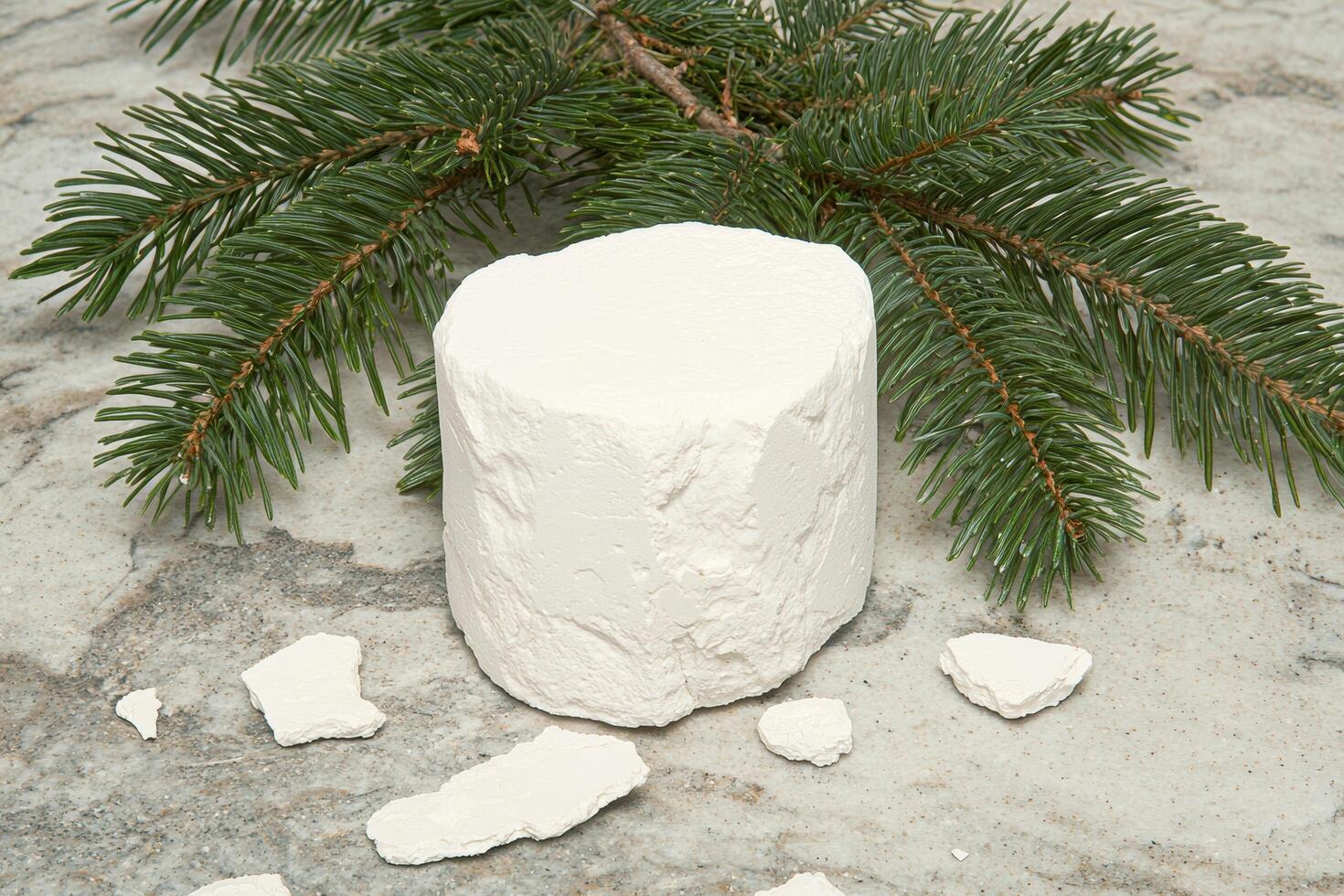 Snowy white marshmallow on pine branches photo