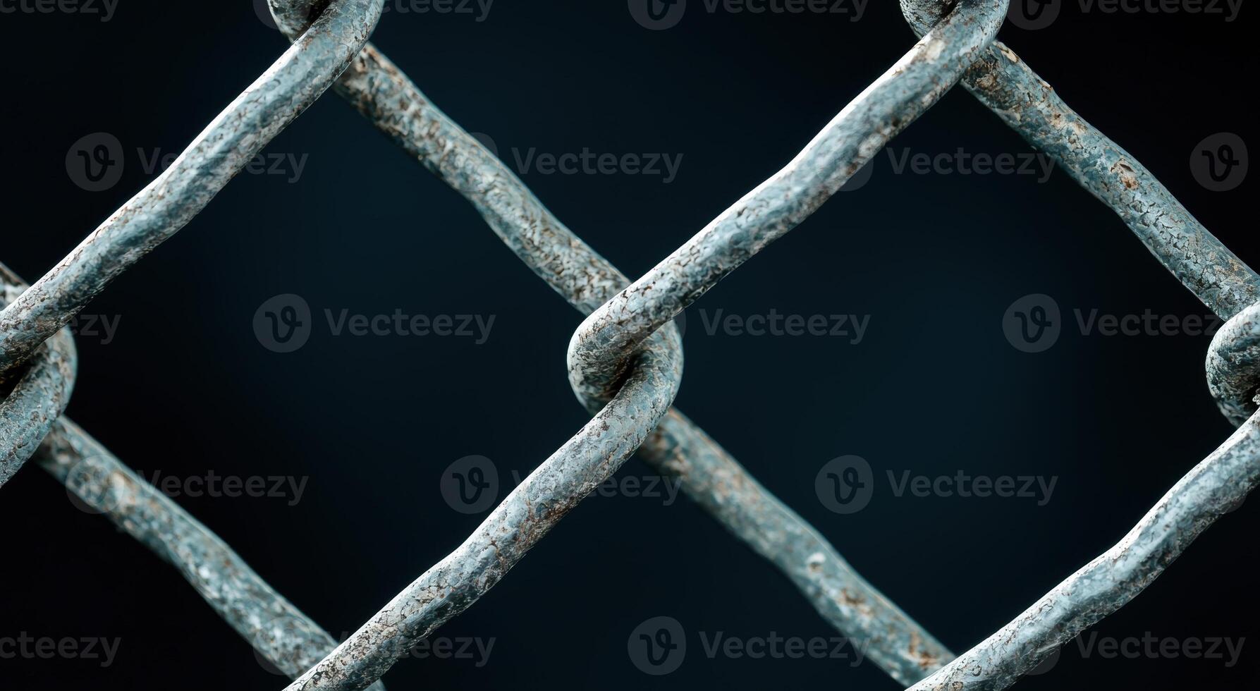 Rusty metal grid against dark background photo