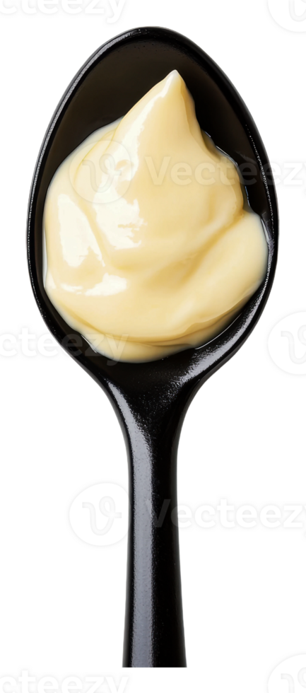Creamy condiment served in a black spoon png