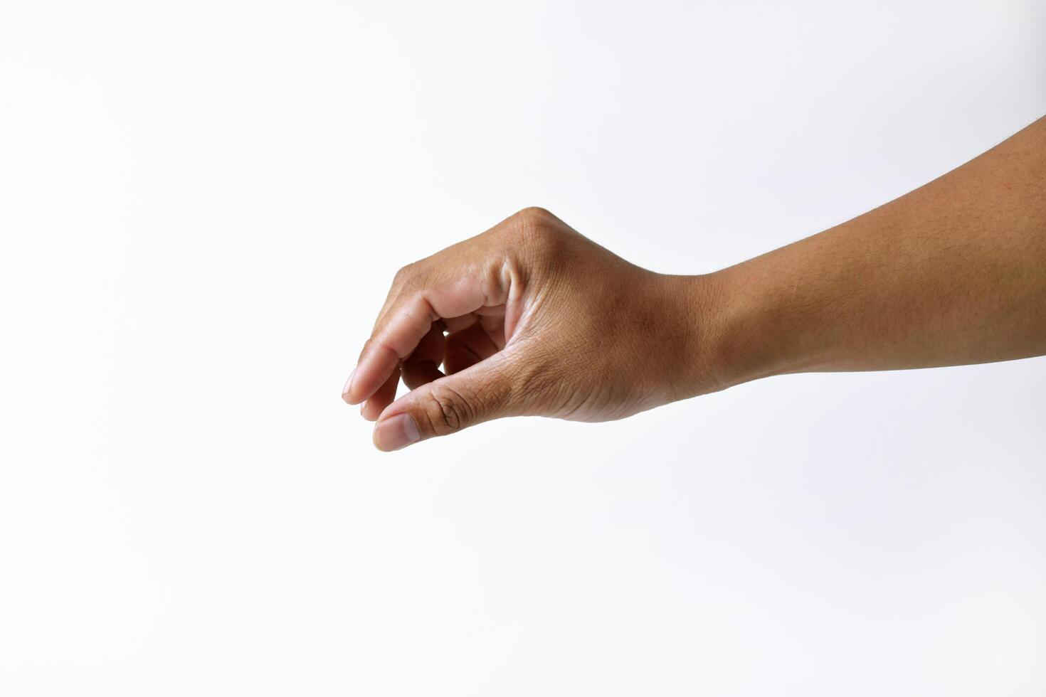 the pose of a man's hand taking something on a white background photo
