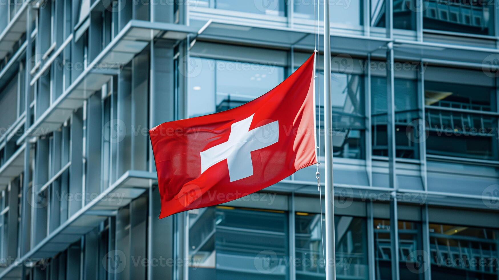 Switzerland national flag and government building with skyscrapers. photo
