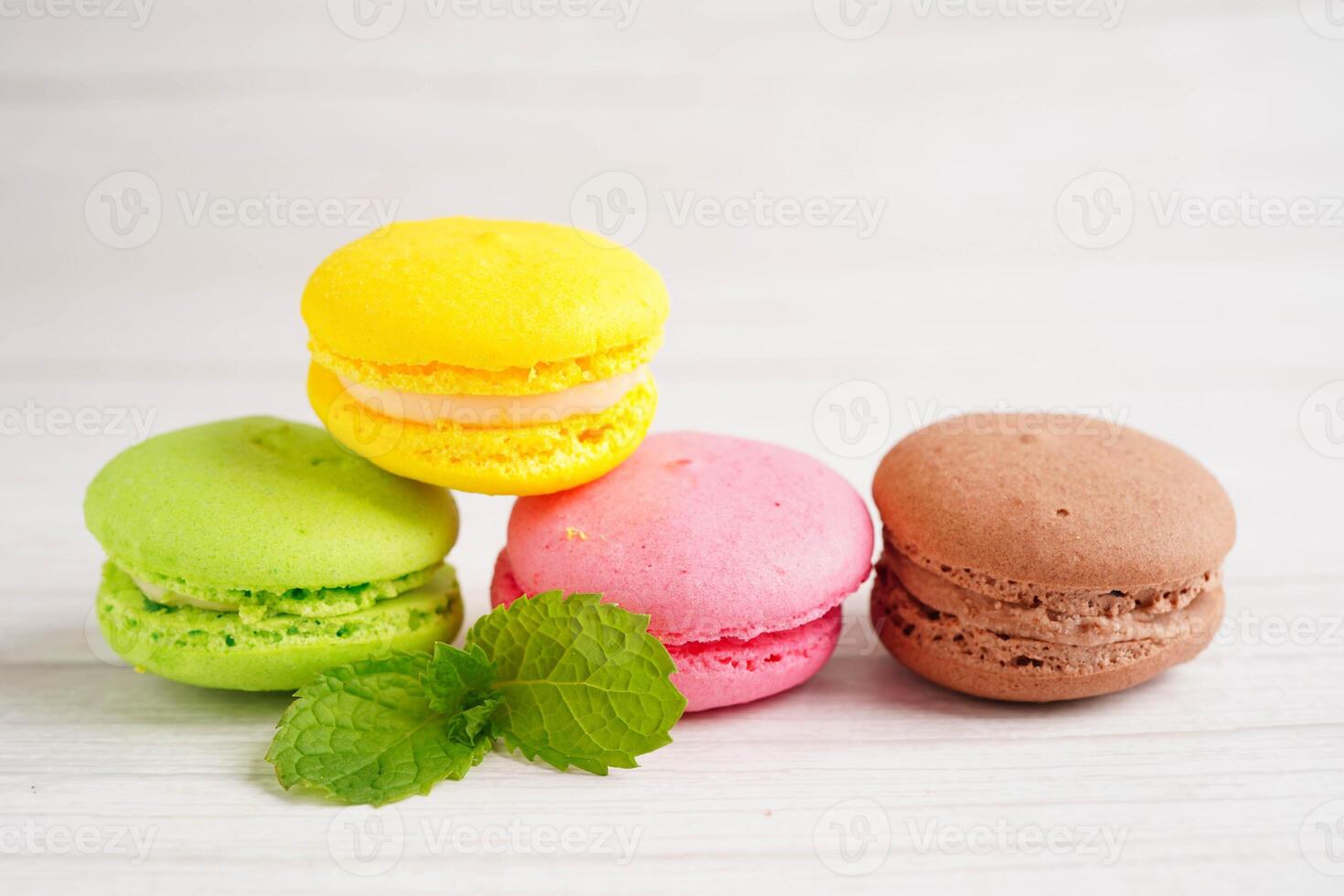 Macaron or french macaroon dessert, cake and cookies on the celebrated birthday. photo