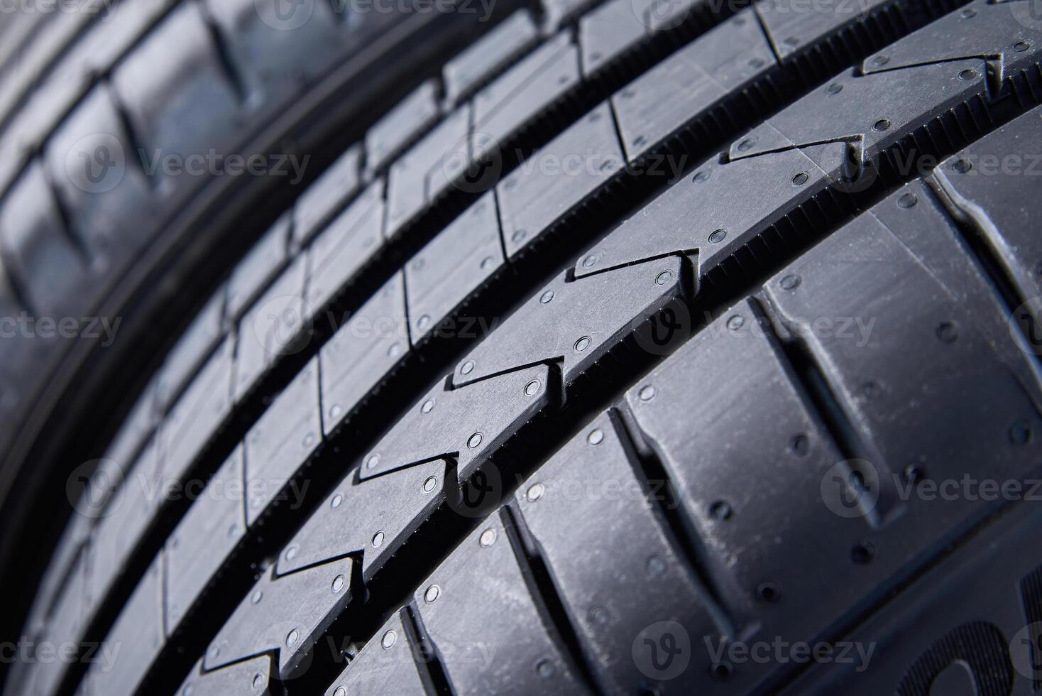 Close up on new summer tire with tread pattern photo