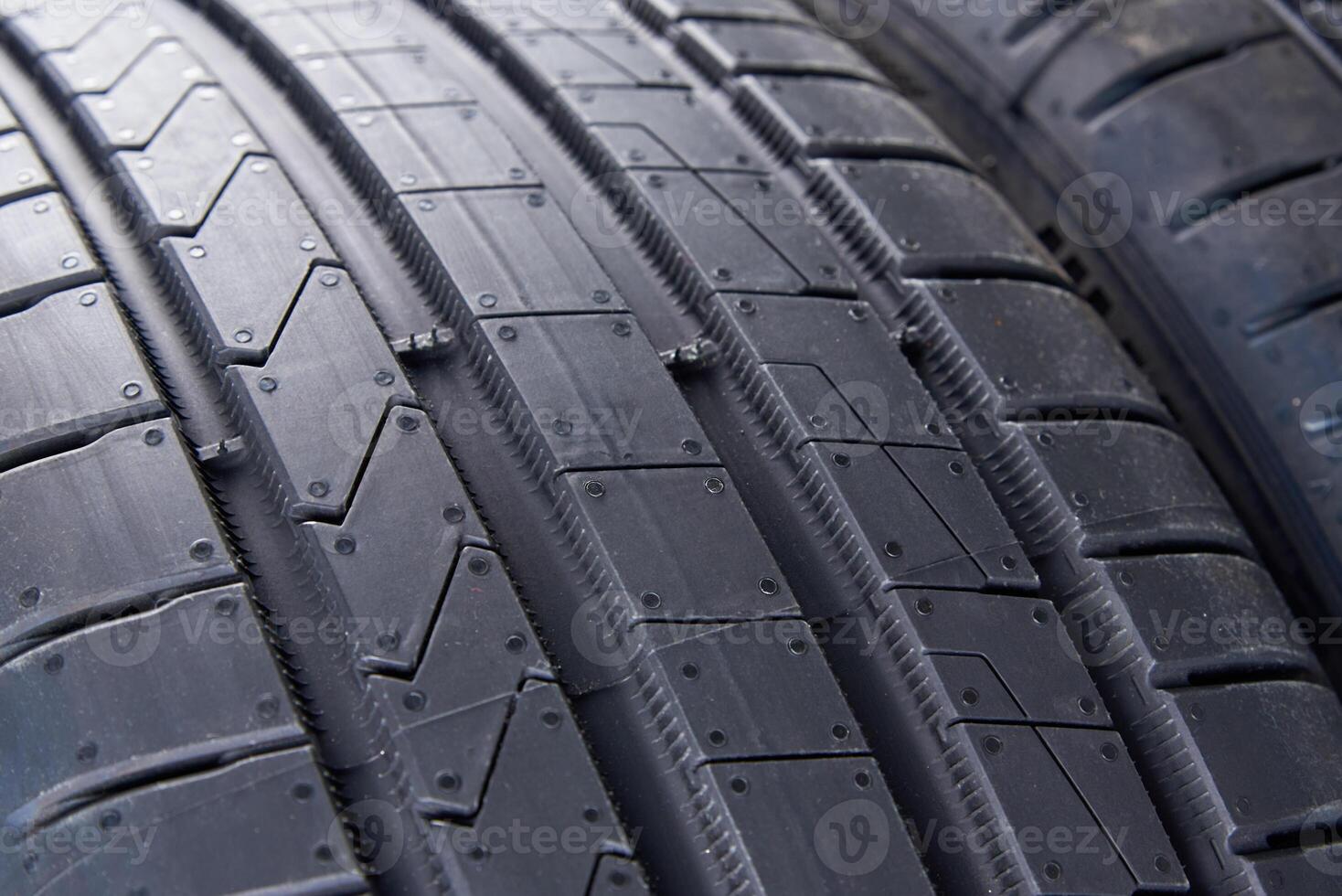 Close up on new summer tire with tread pattern photo