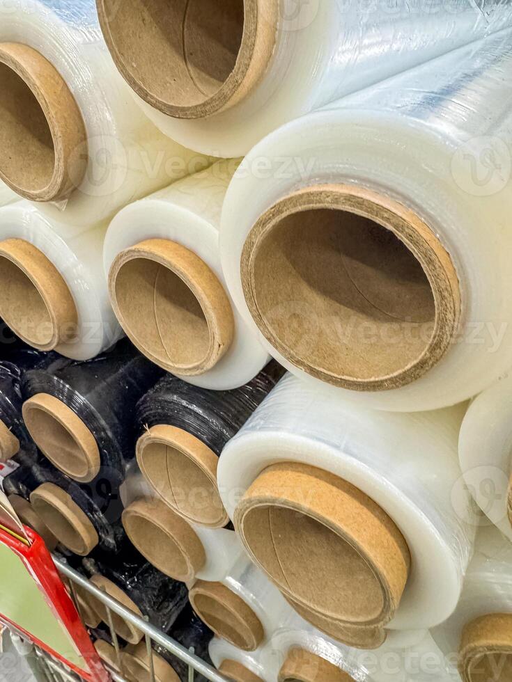 Stacked Industrial Plastic Wrap Rolls for Packaging and Shipping Supplies . High quality photo
