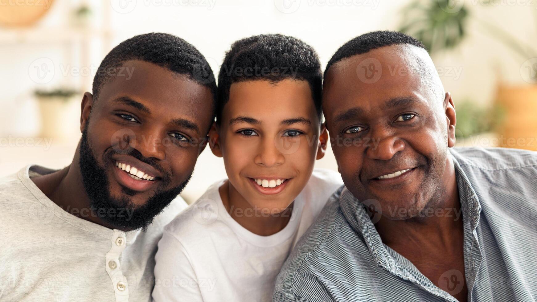 Family Members. Portrait Of Handsome African American Grandfather, Father And Son Smiling At Camera, Posing For Photo At Home, Closeup