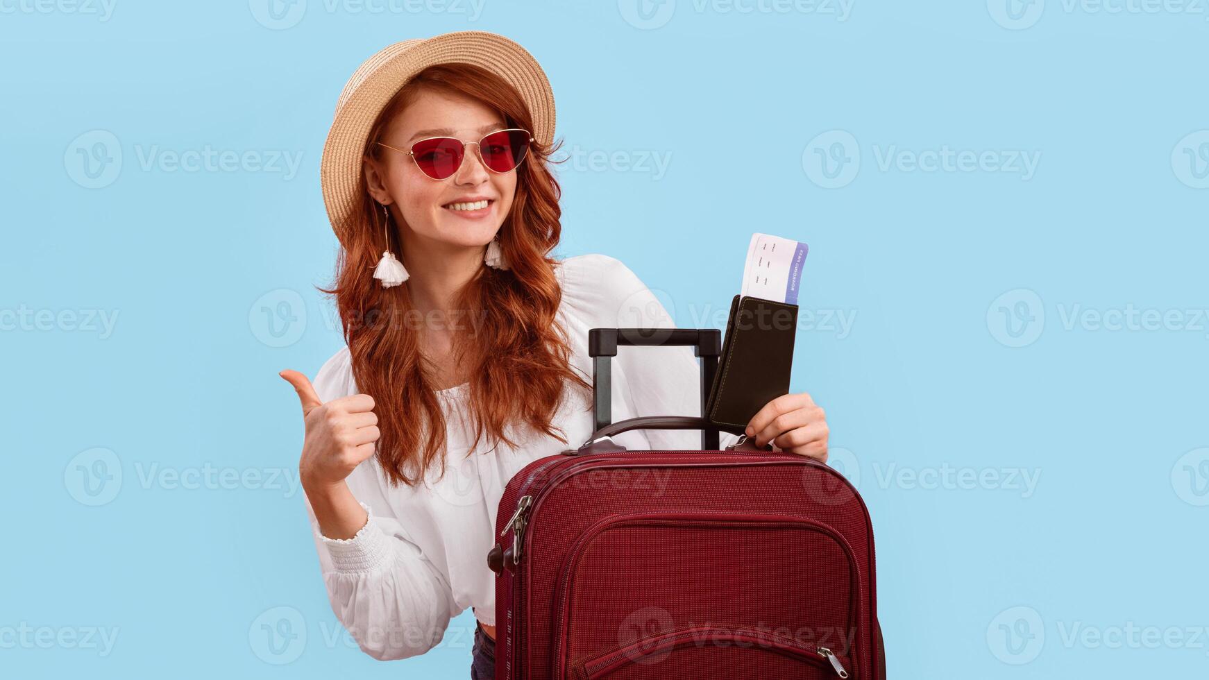 I Like Travel. Girl Posing With Suitcase Holding Tickets And Passport Gesturing Thumbs Up Over Pink Studio Background. Panorama photo