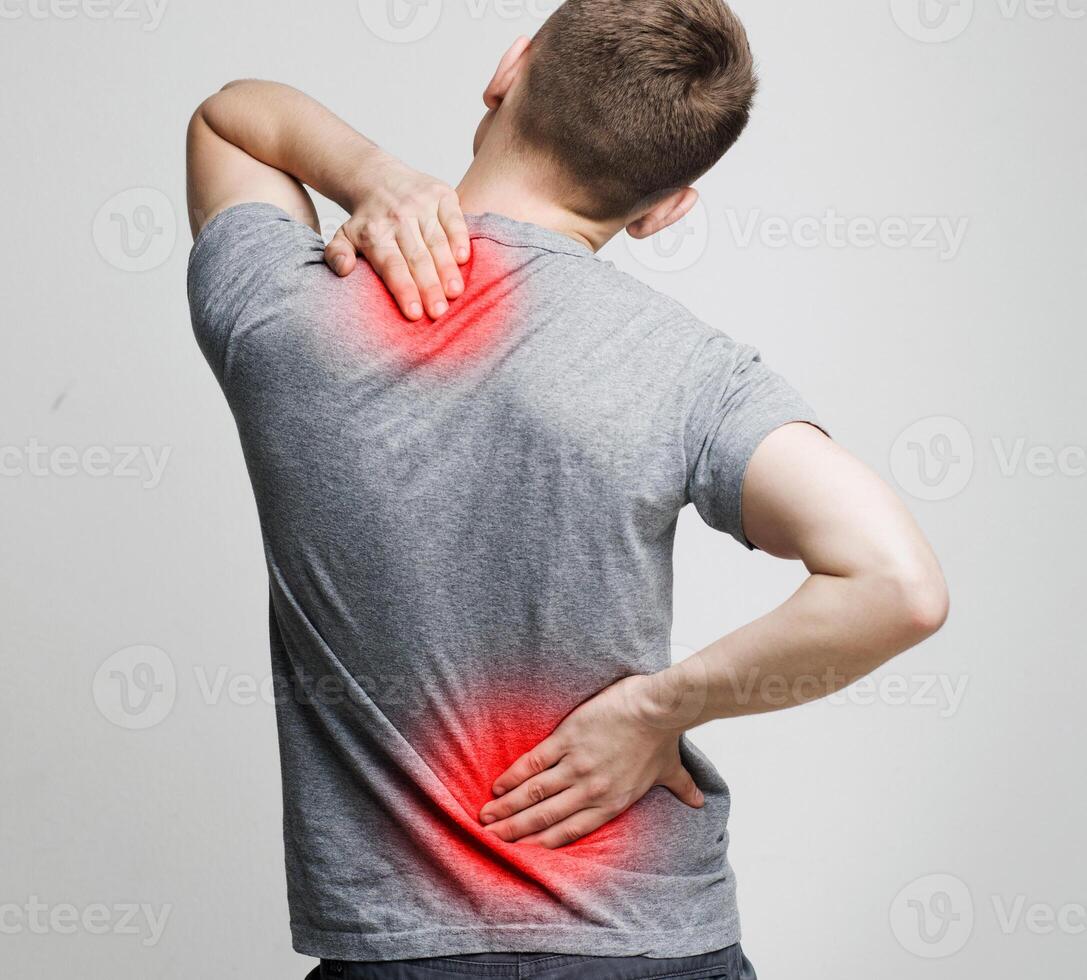Spine osteoporosis. Scoliosis. Spinal cord problems on man's back. photo