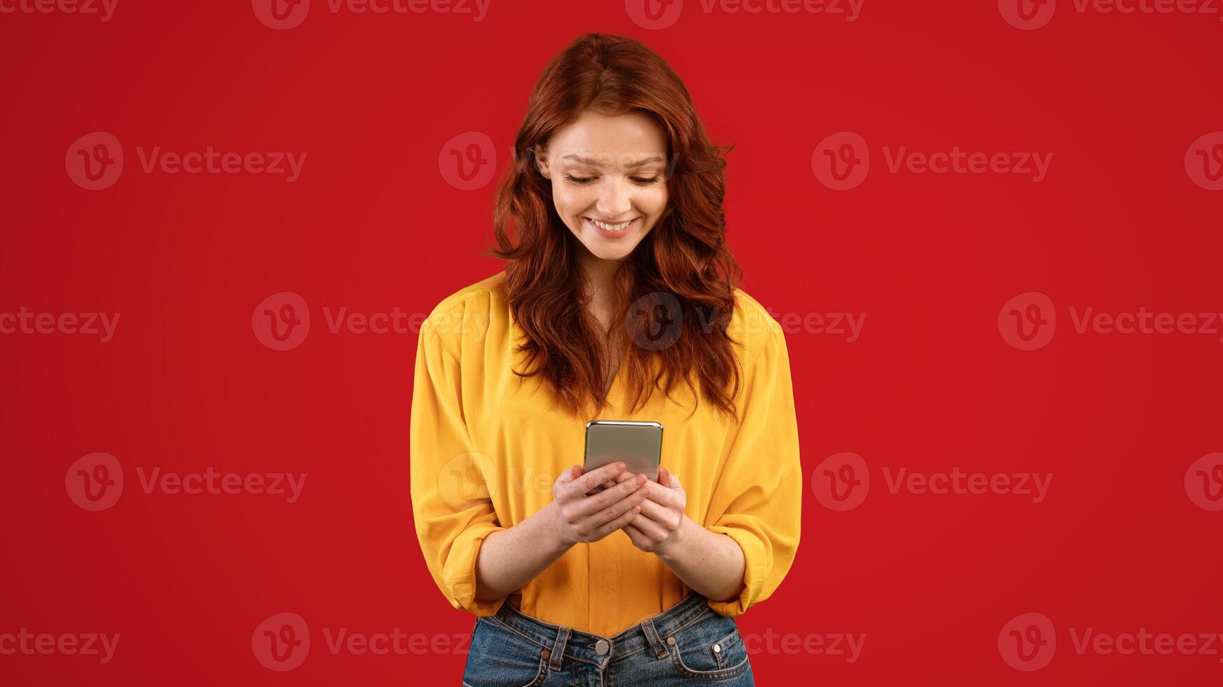 Teen Girl Using Smartphone Social Media App Standing On Green Studio Background. Mobile Application, Panorama photo