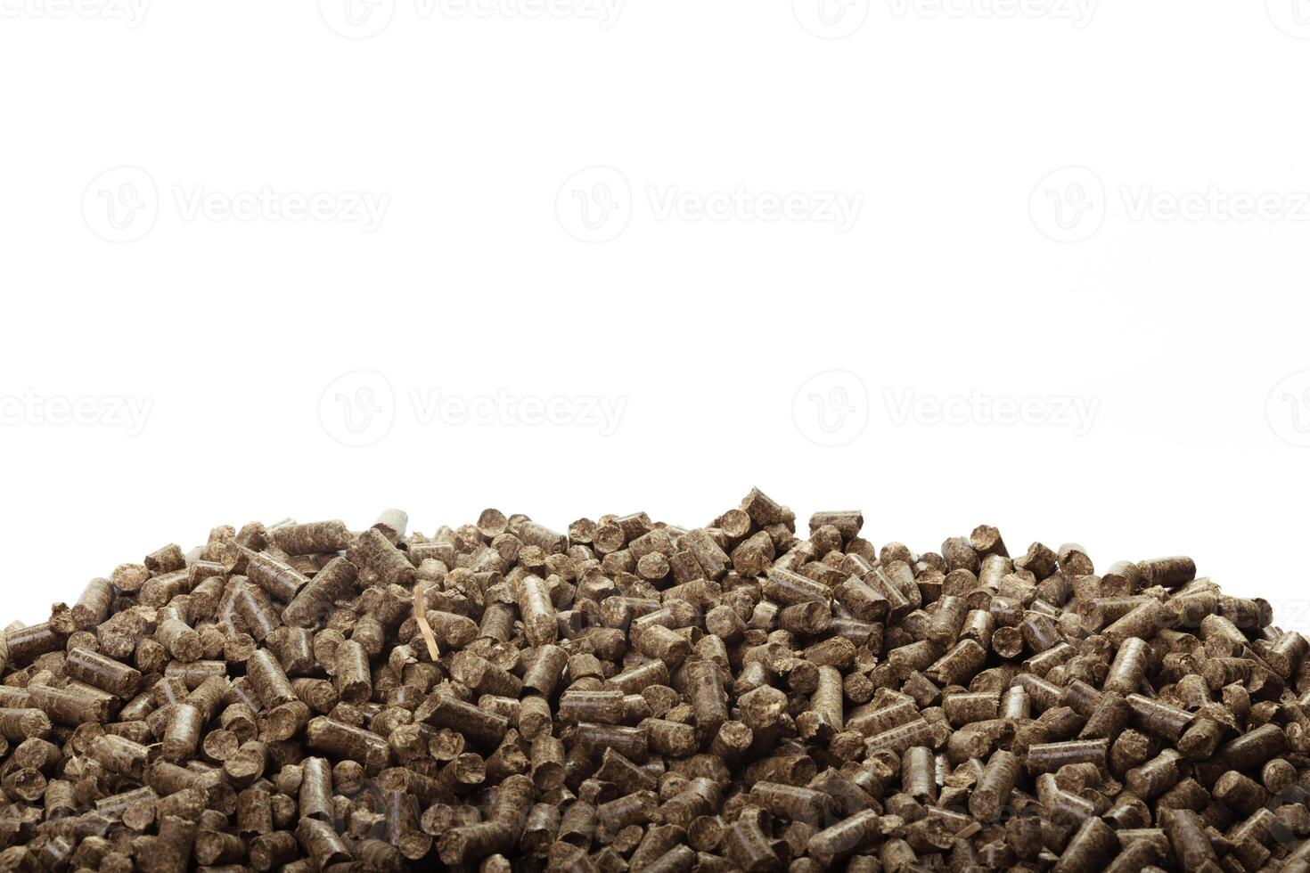 Wood pellets in the background. photo