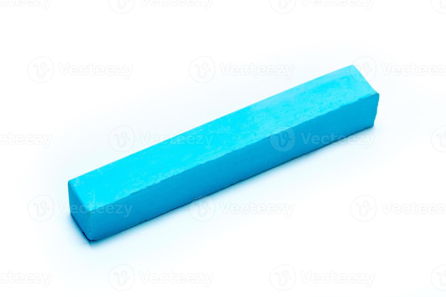 chalks in a variety of colors arranged on a white background photo