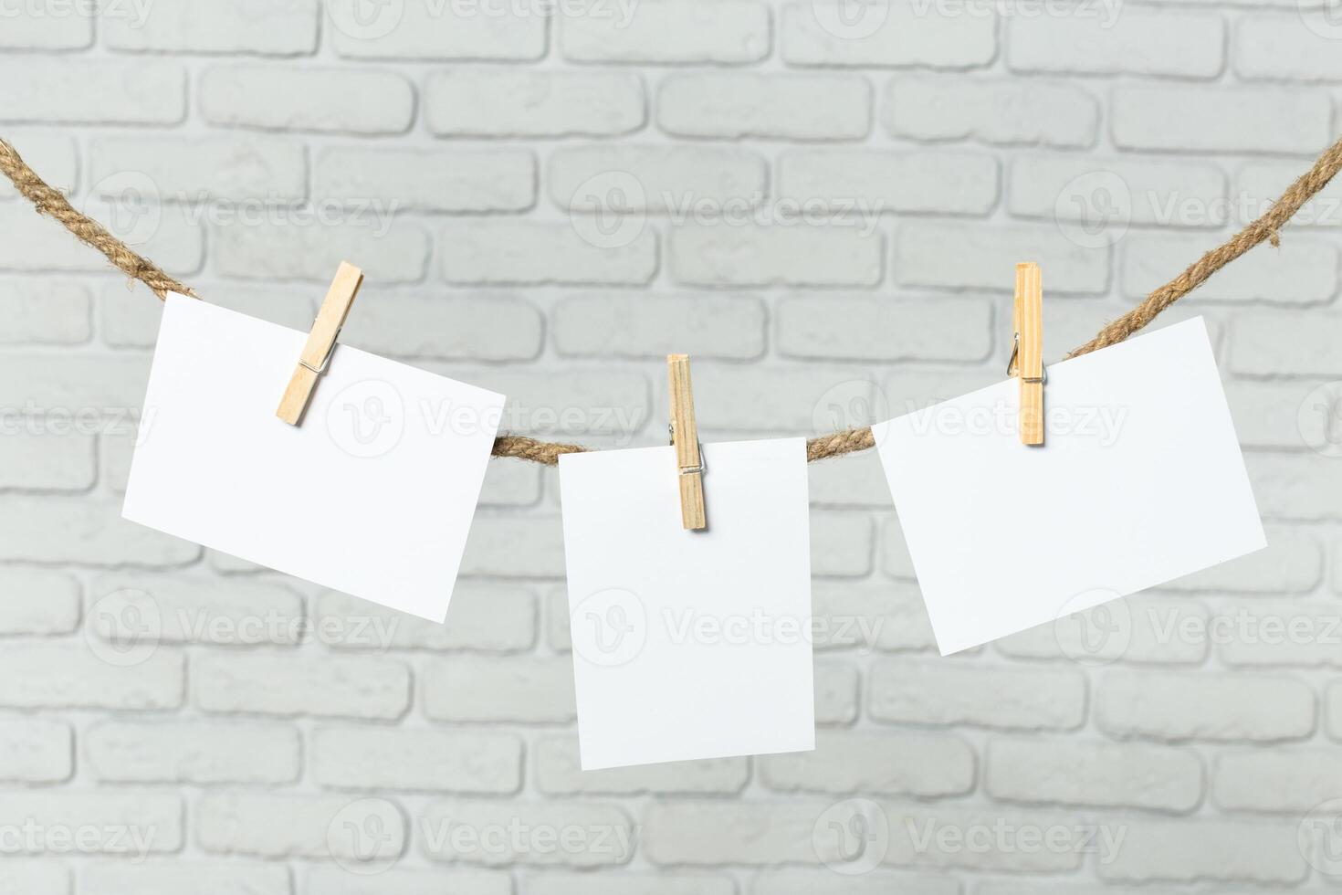 Photo paper attach to rope with clothes pins