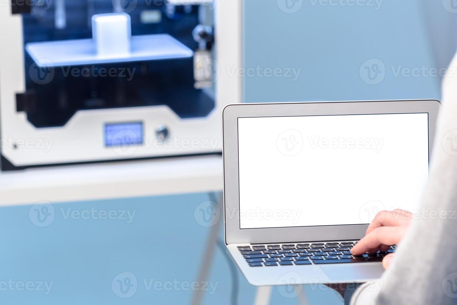 Designer Working With 3D Printer photo