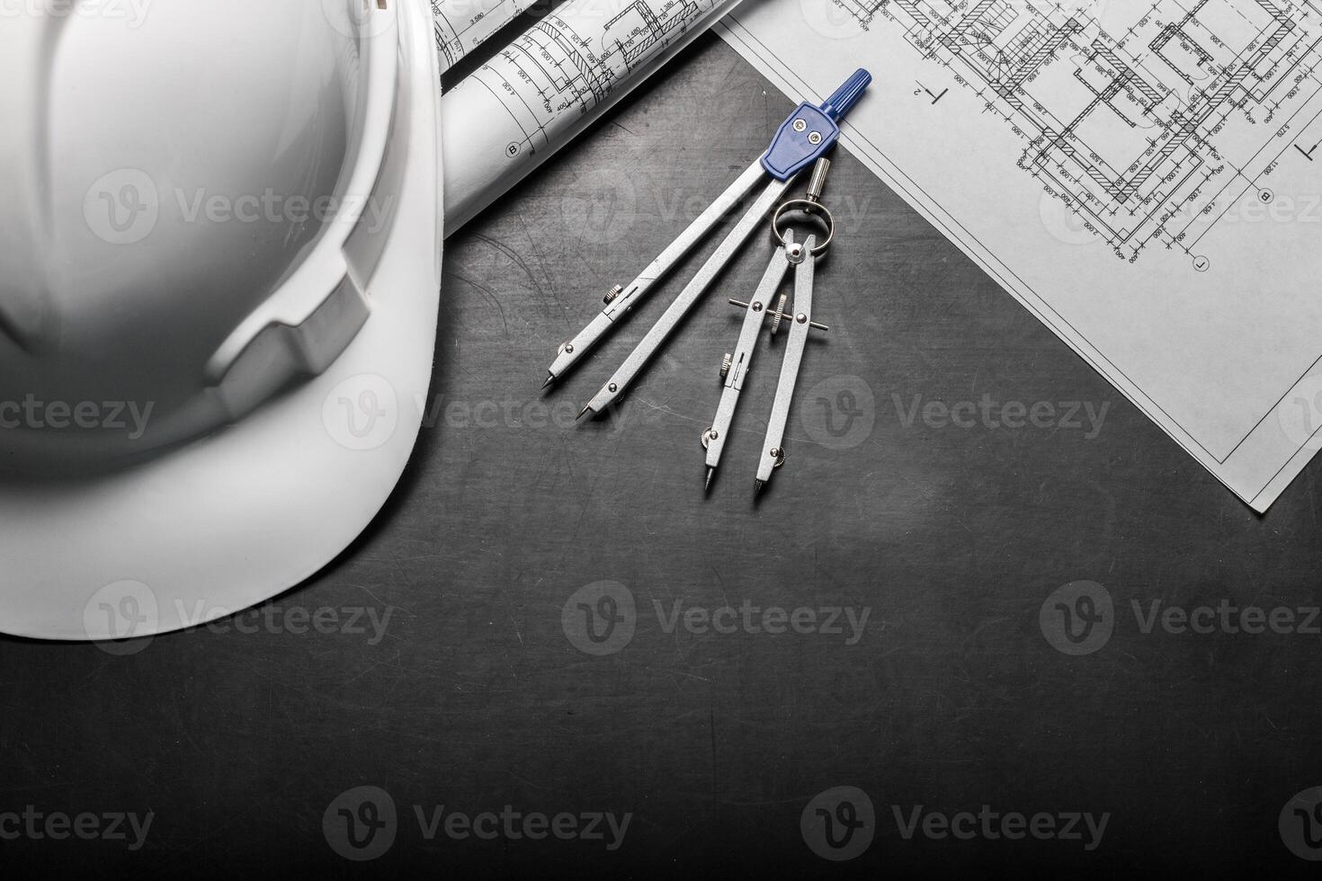 Construction planning drawings on black background photo