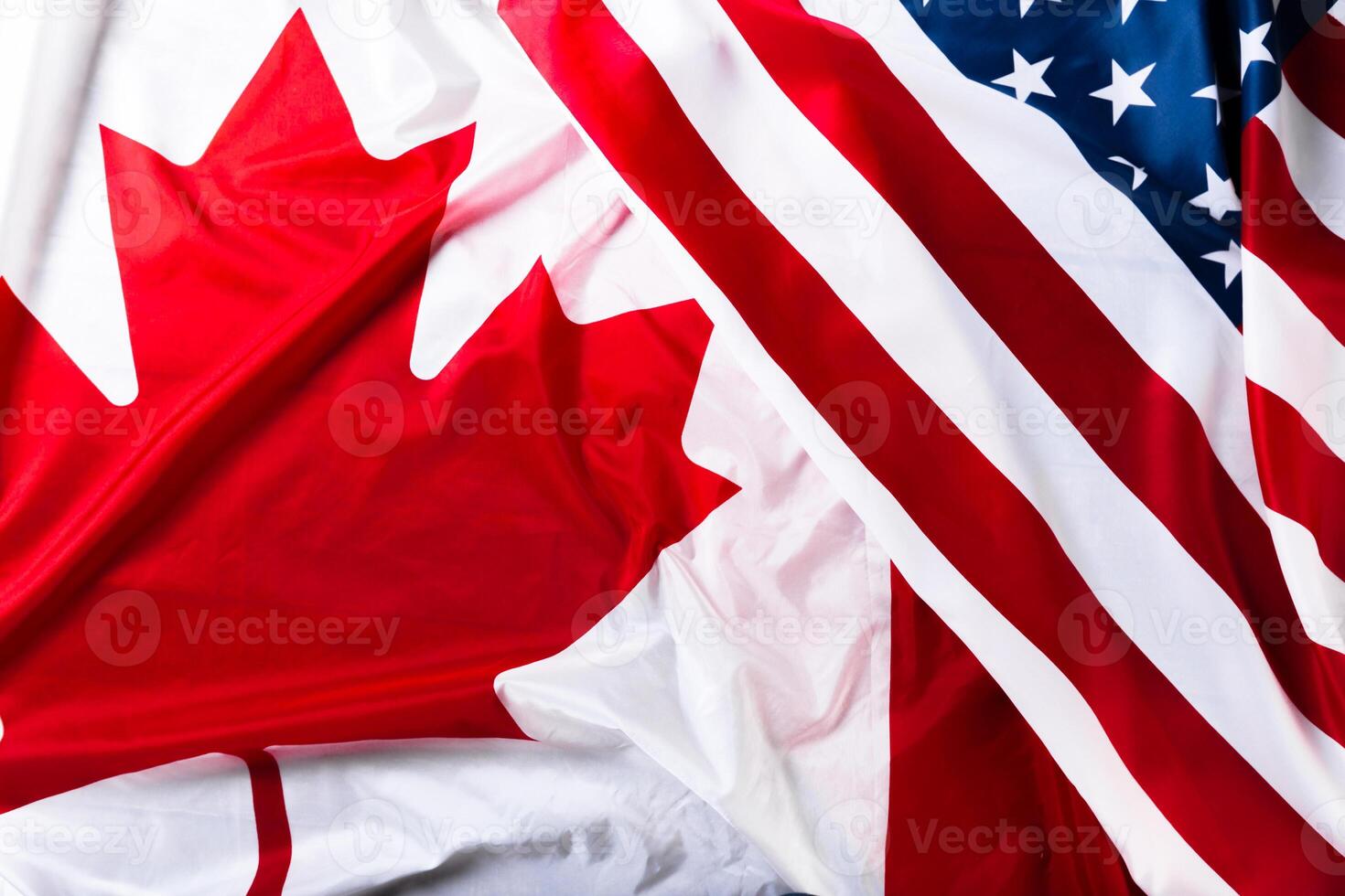 American and Canadian flags together photo