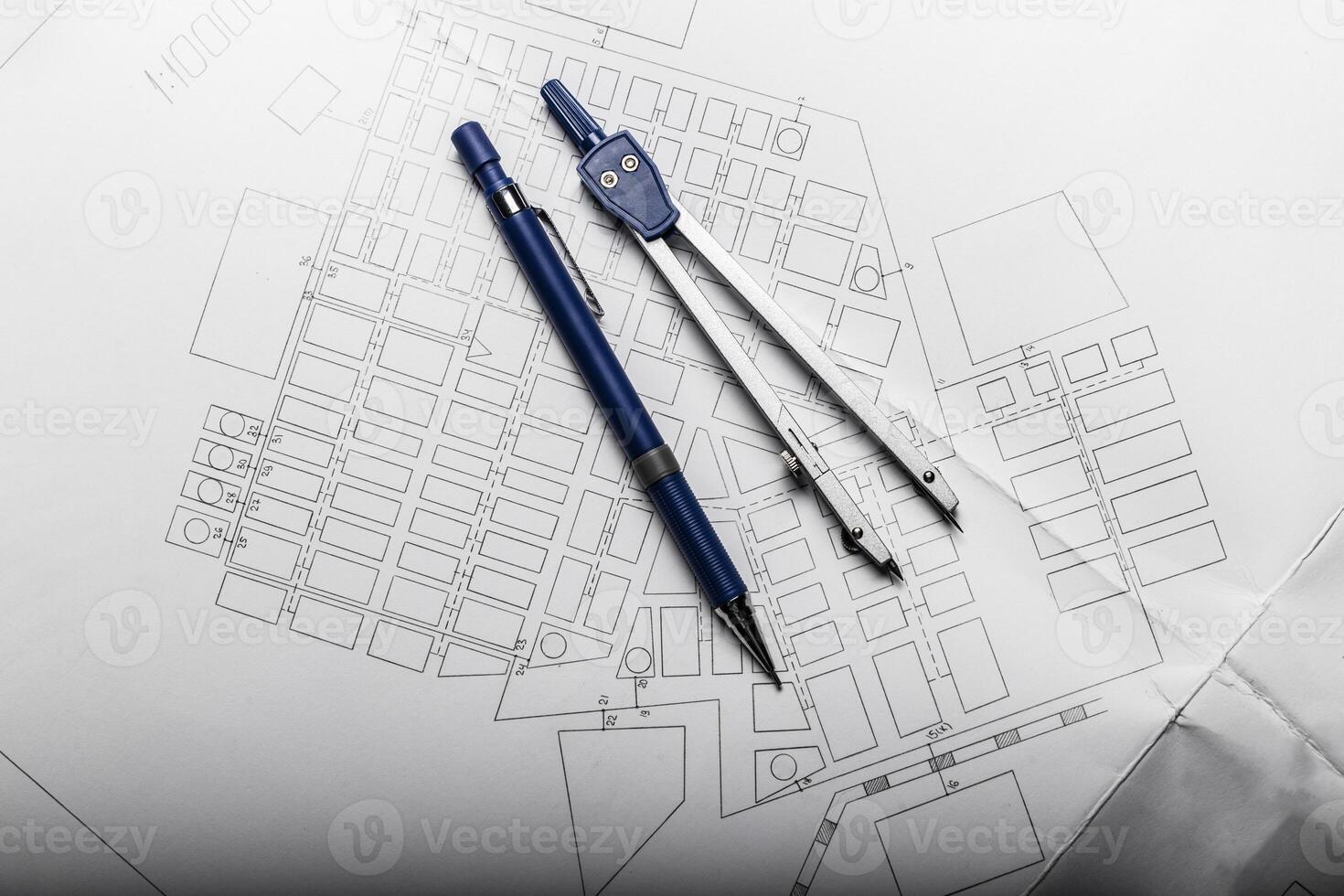 Construction planning drawings on black background photo
