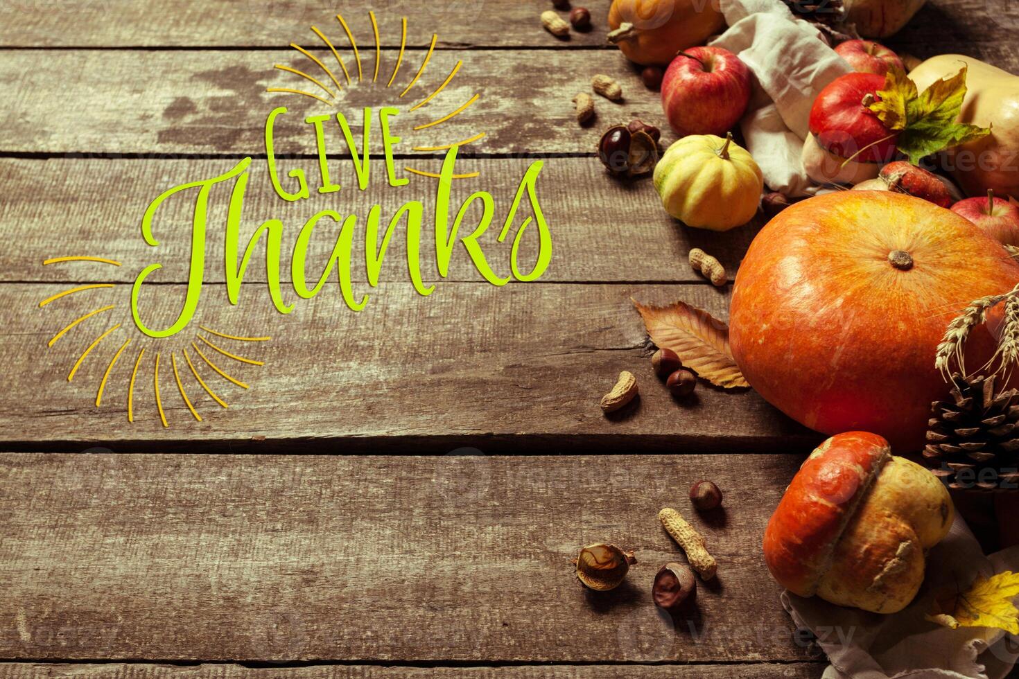 Happy thanksgiving day display on wooden background photo