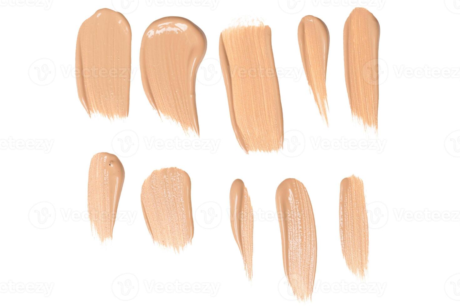 smeared foundation natural make up on white background photo
