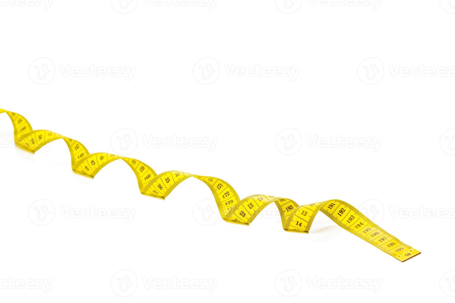 yellow metric measuring tape isolated on white panorama background photo