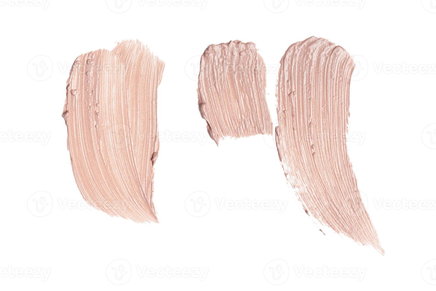 smeared foundation natural make up on white background photo