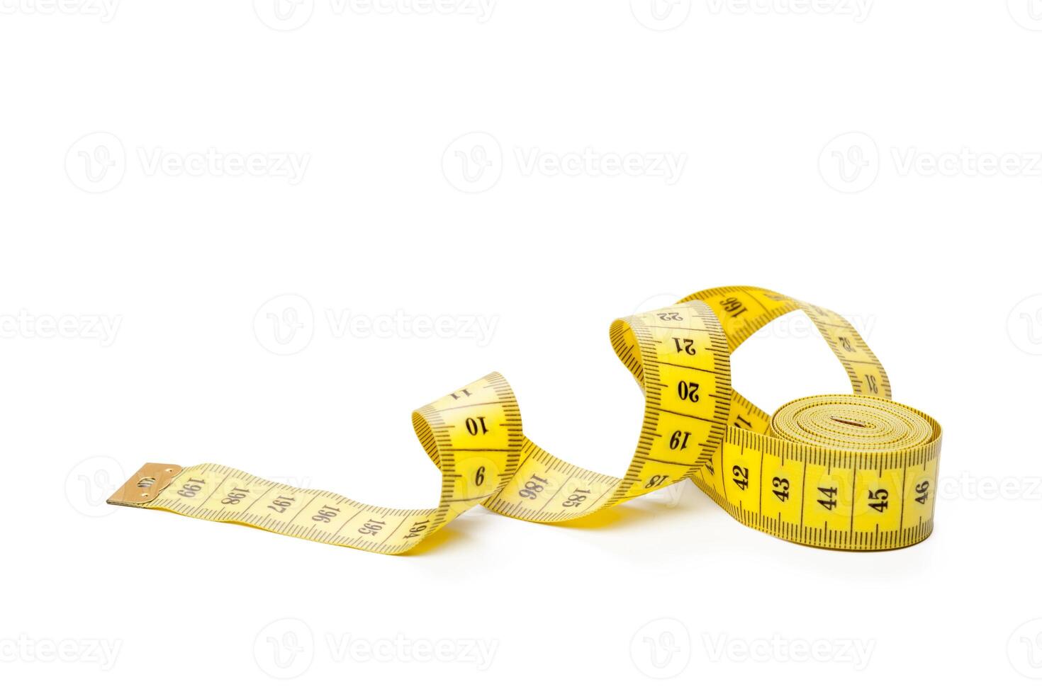 yellow metric measuring tape isolated on white panorama background photo