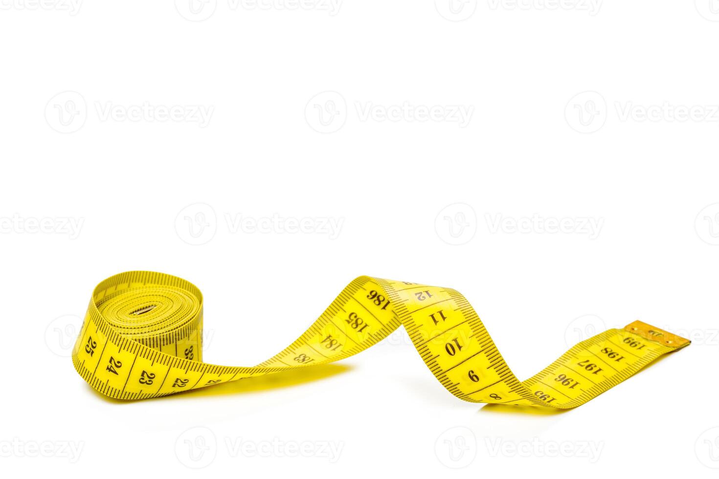 yellow metric measuring tape isolated on white panorama background photo