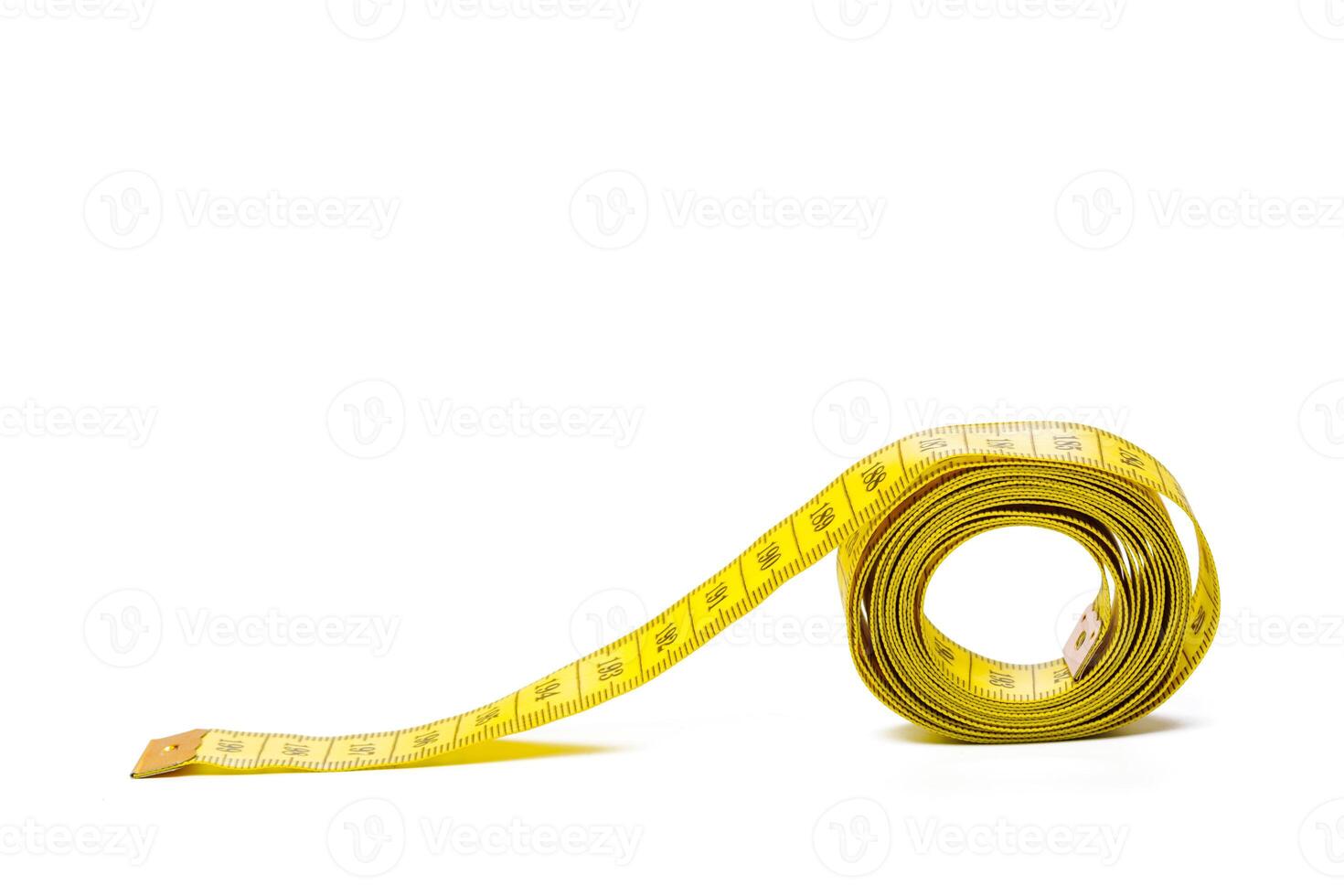 yellow metric measuring tape isolated on white panorama background photo
